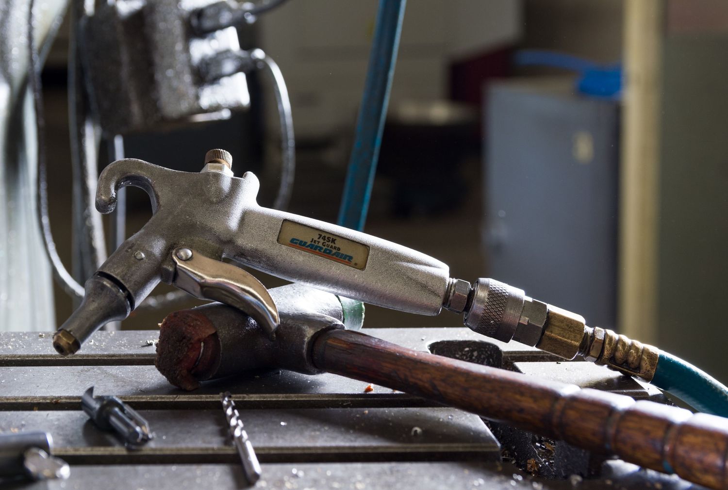 Collection of vintage industrial tools and equipment on display.