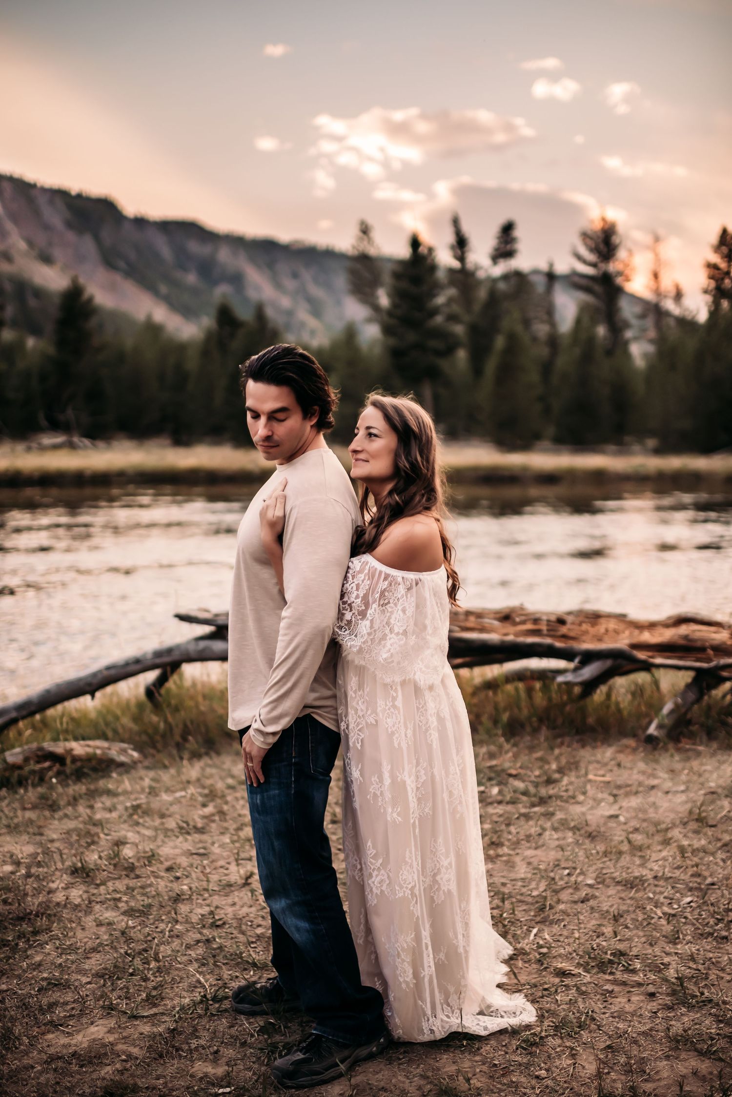 Couple enjoying an intimate moment in Yellowstone National Park.