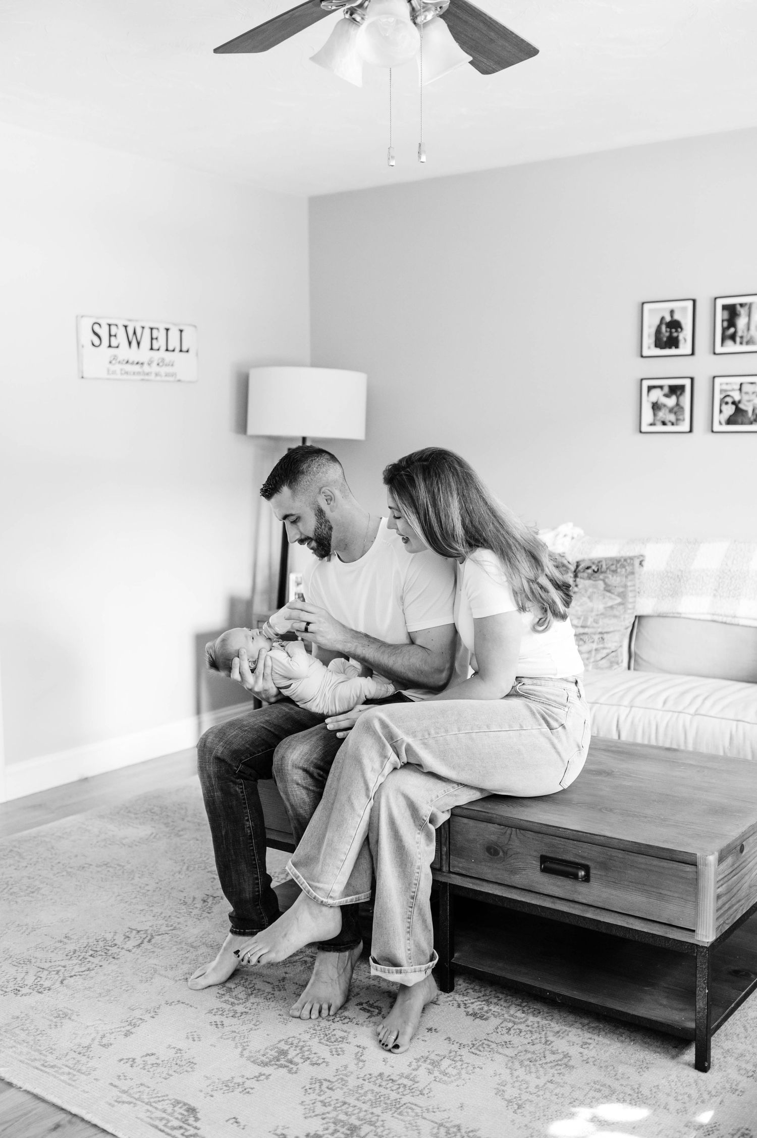 Black and white photo series showing intimate moments in a minimalist bedroom with a wooden bed frame.