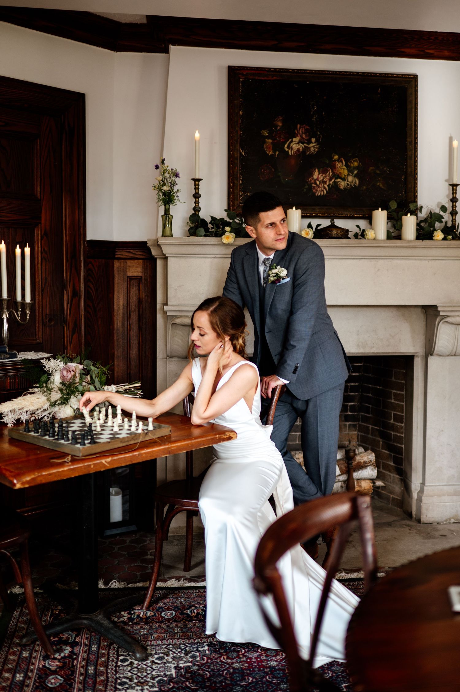 A sequence of intimate moments captured at a vintage-style indoor wedding venue with wooden furniture and white decor.