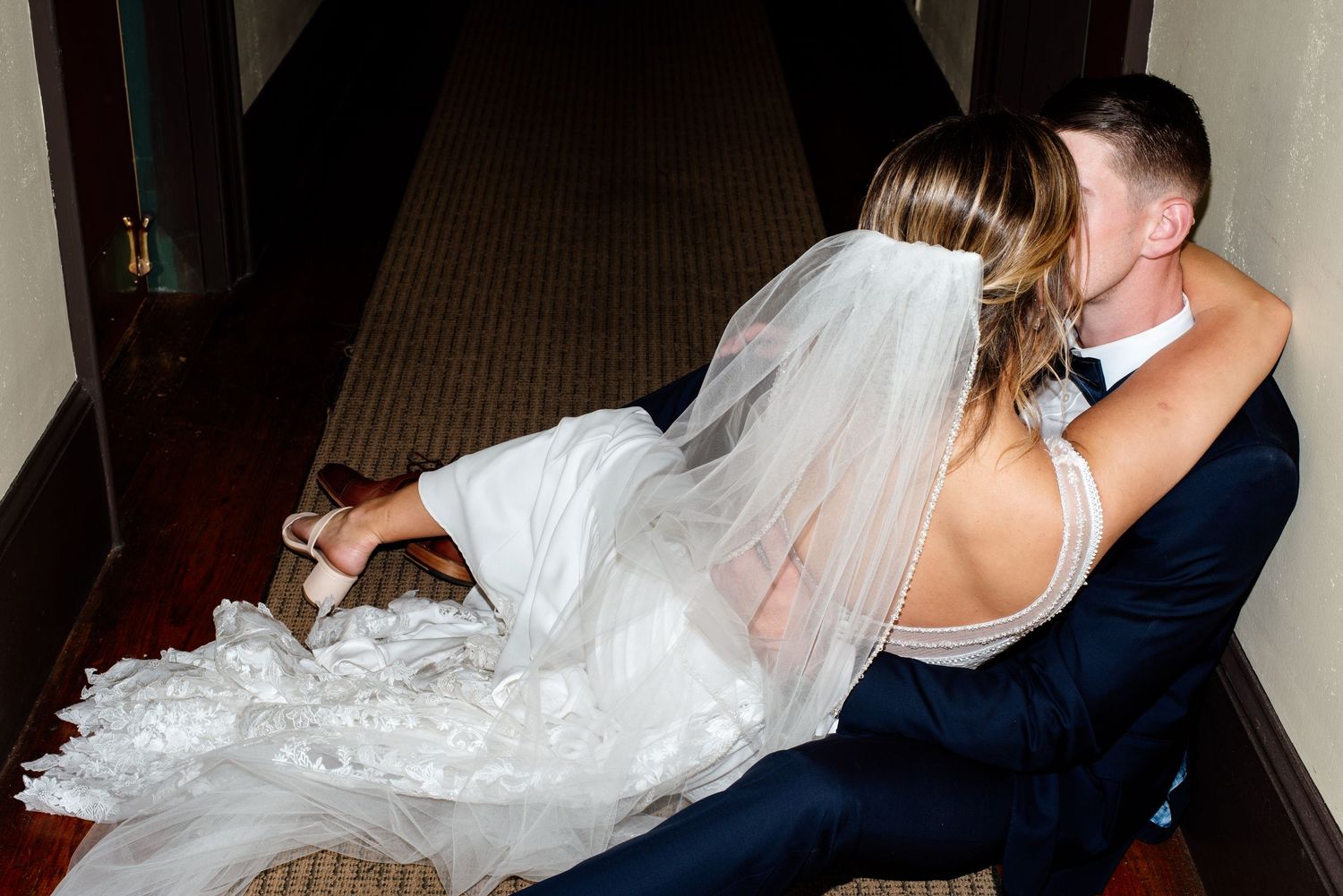 Elegant wedding dance captured in an intimate indoor setting.