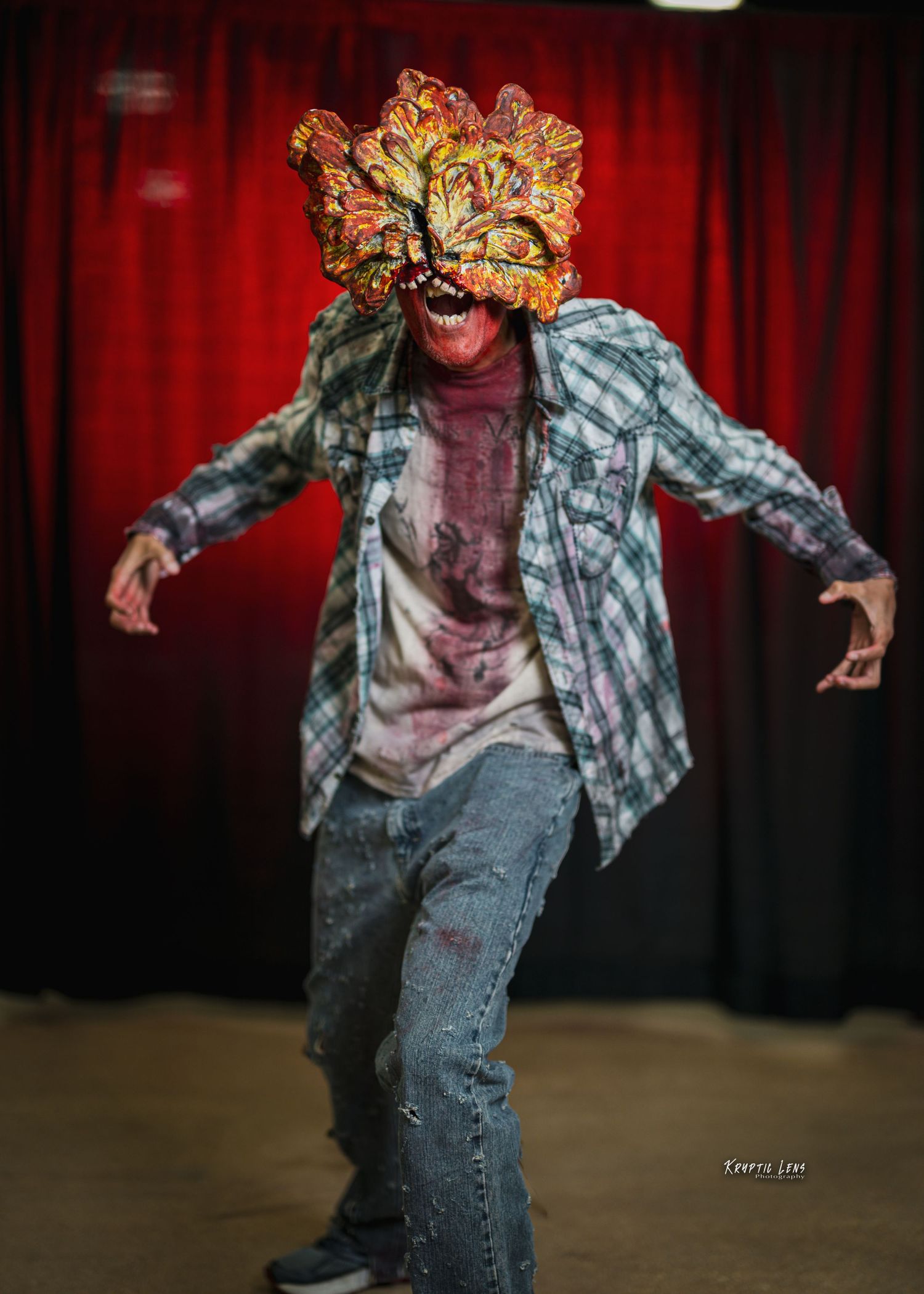 Zombie-style costume with plaid shirt and distressed jeans in dramatic poses.
