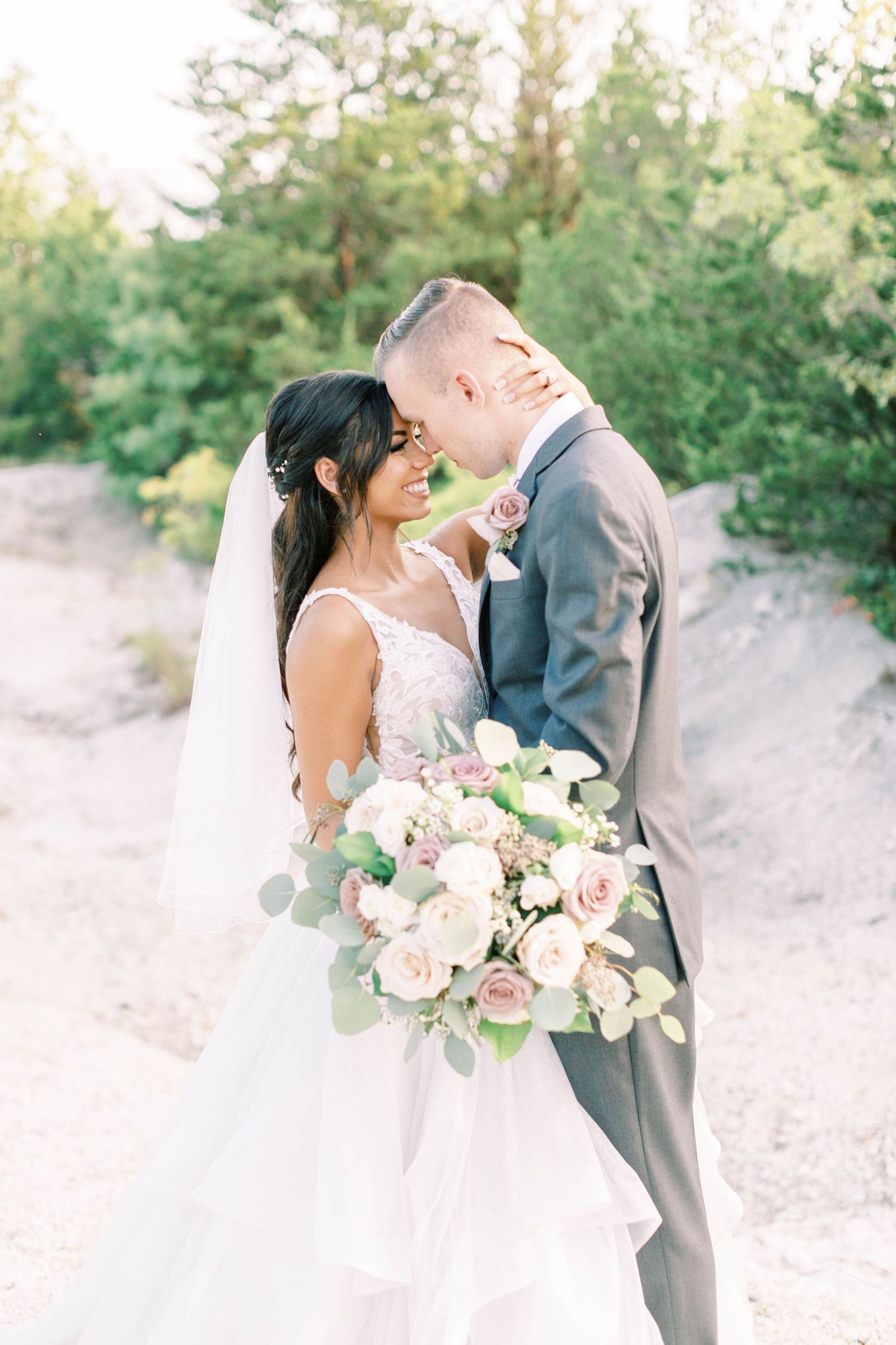 brunette bride with groom during portraits near Dallas, Texas