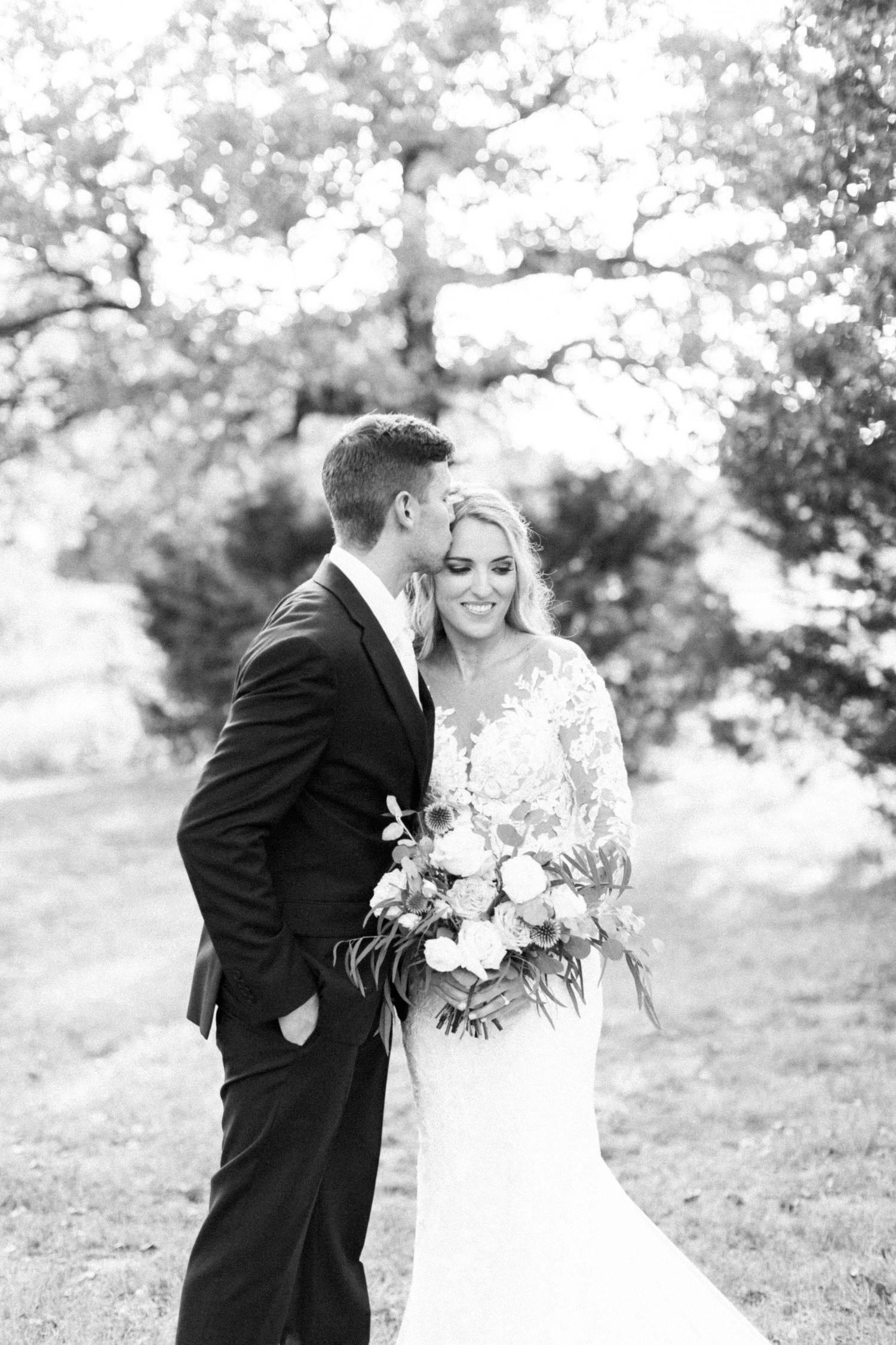 Black and white portrait of bride and groom