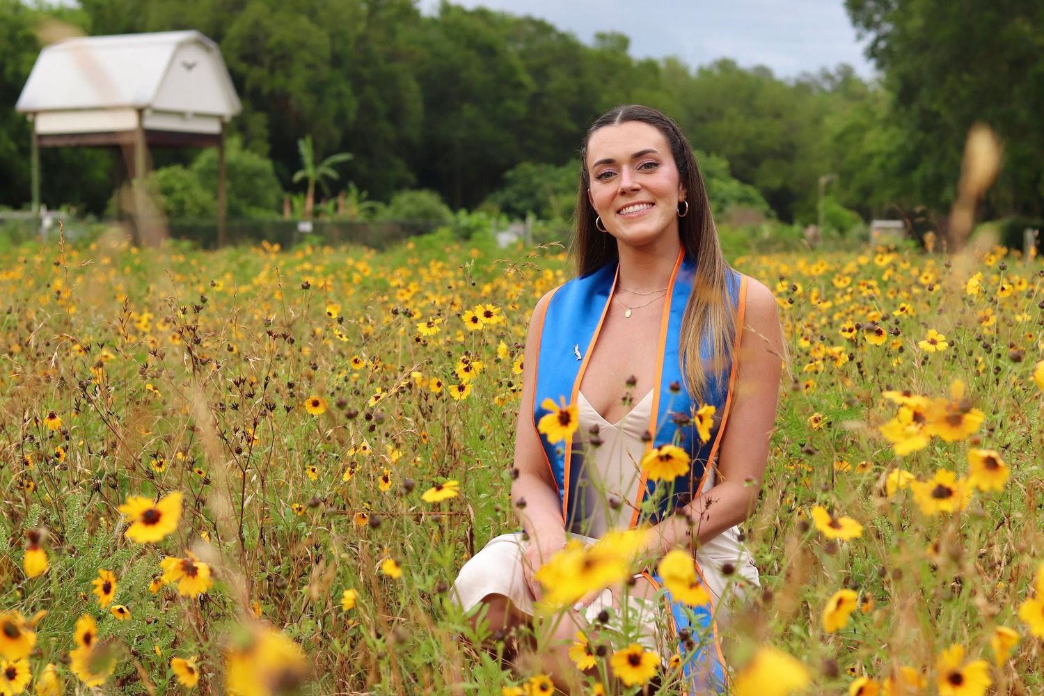 Candid shots in vibrant wildflower field with natural summer lighting.