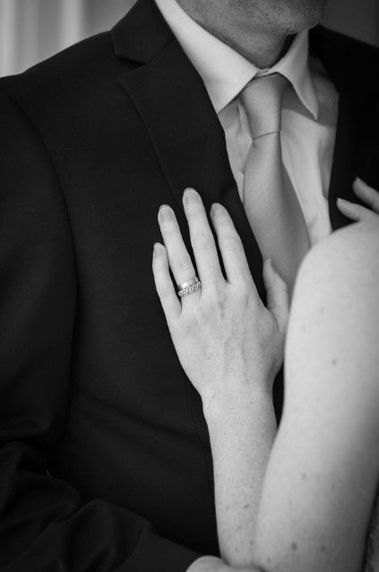 Black and white close-up of an engagement ring and intimate couple poses.