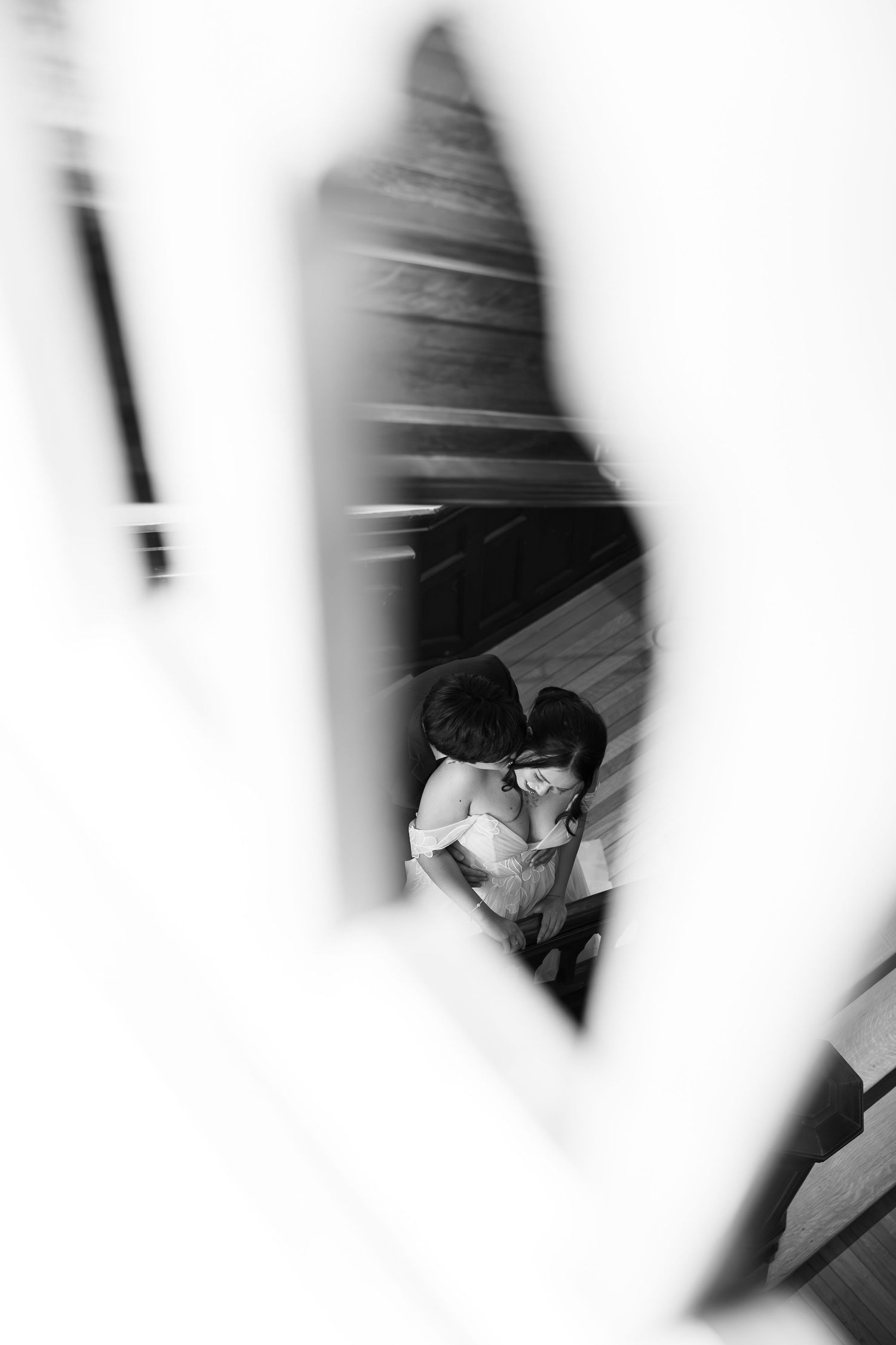 Artistic black and white abstract wedding photo with soft motion blur effects.