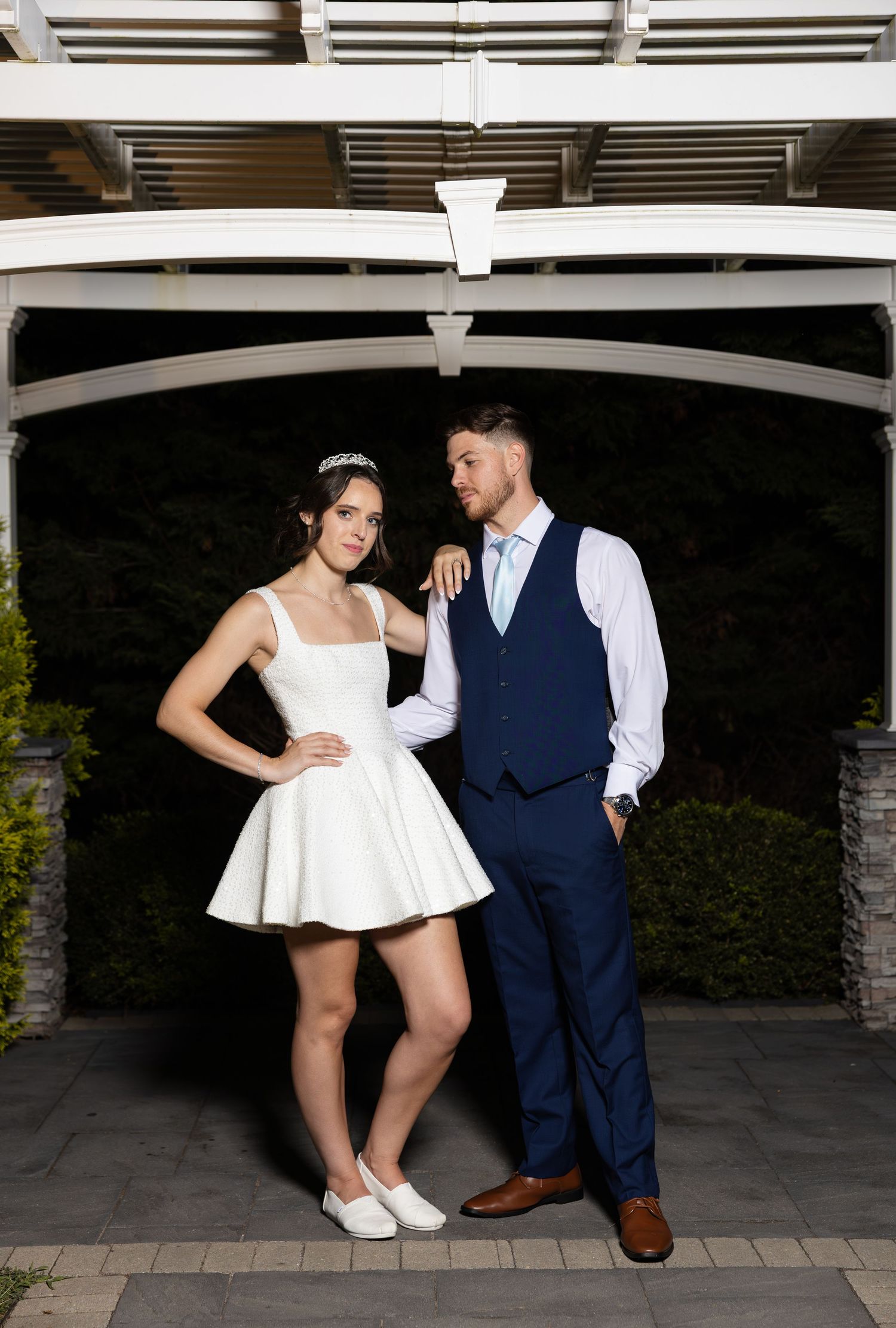 Nighttime couples portraits during wedding reception.