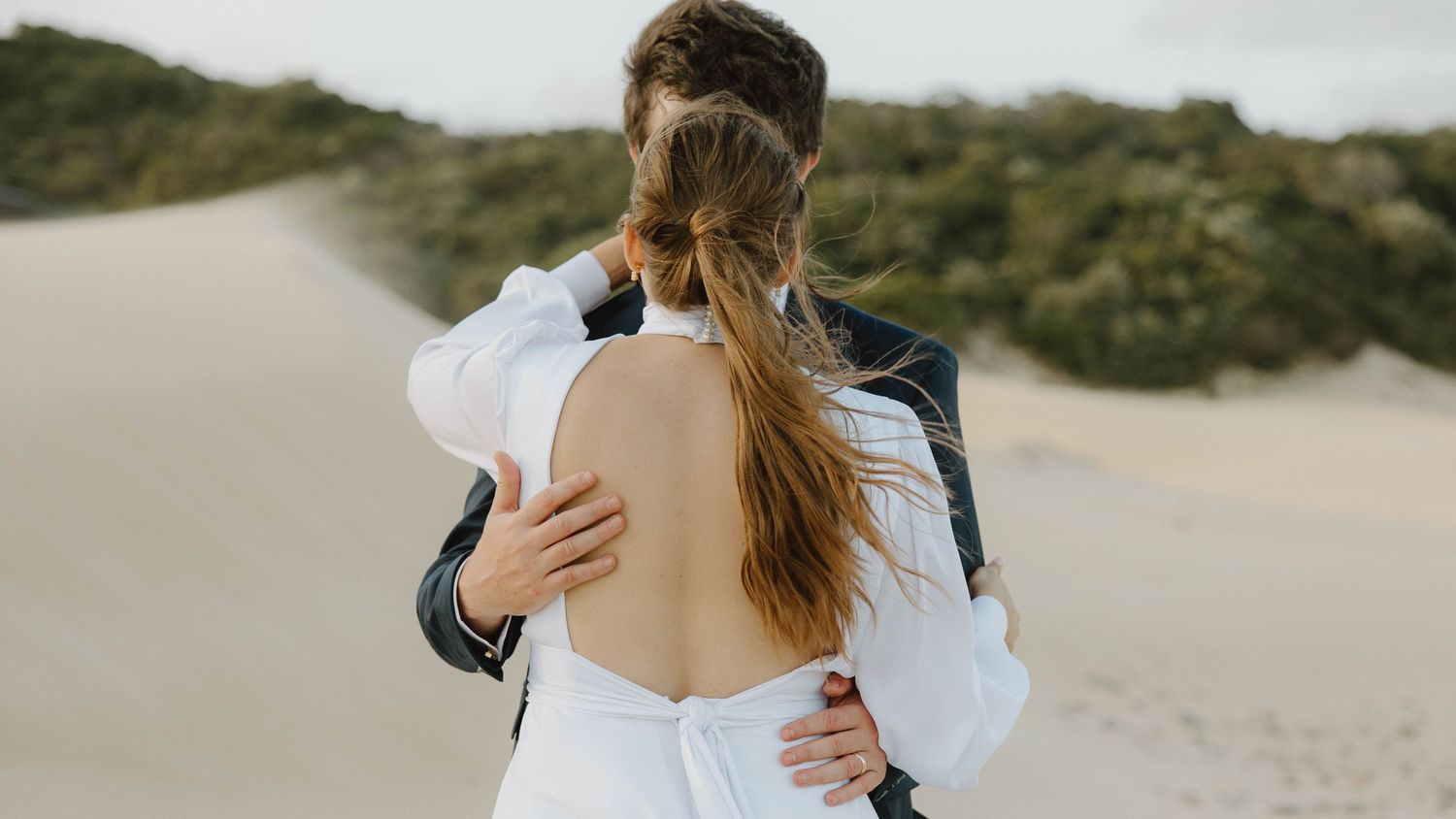 Romantic bride and groom portraits on beach in Eastern Cape