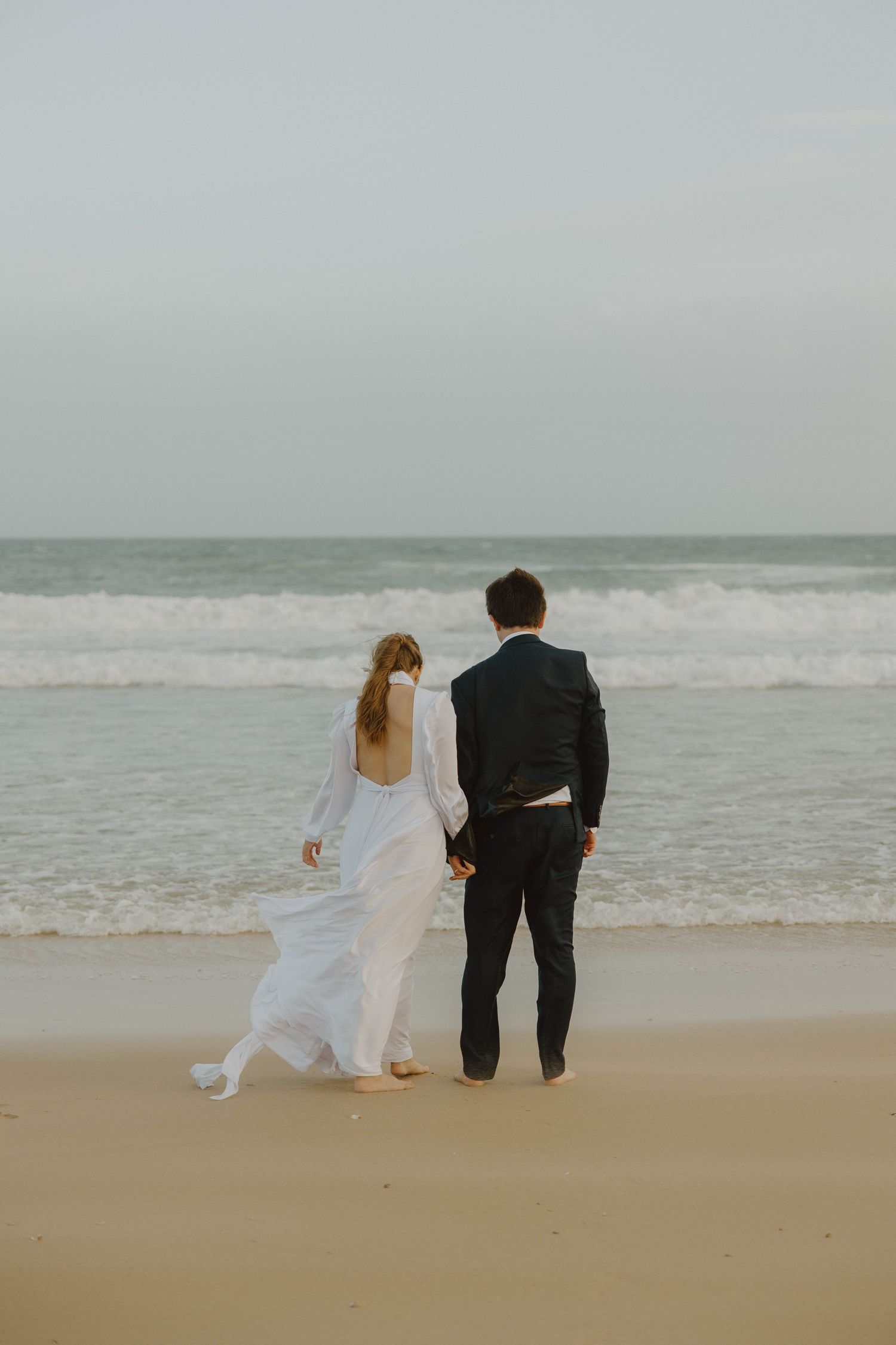 Romantic bride and groom portraits on beach in Eastern Cape