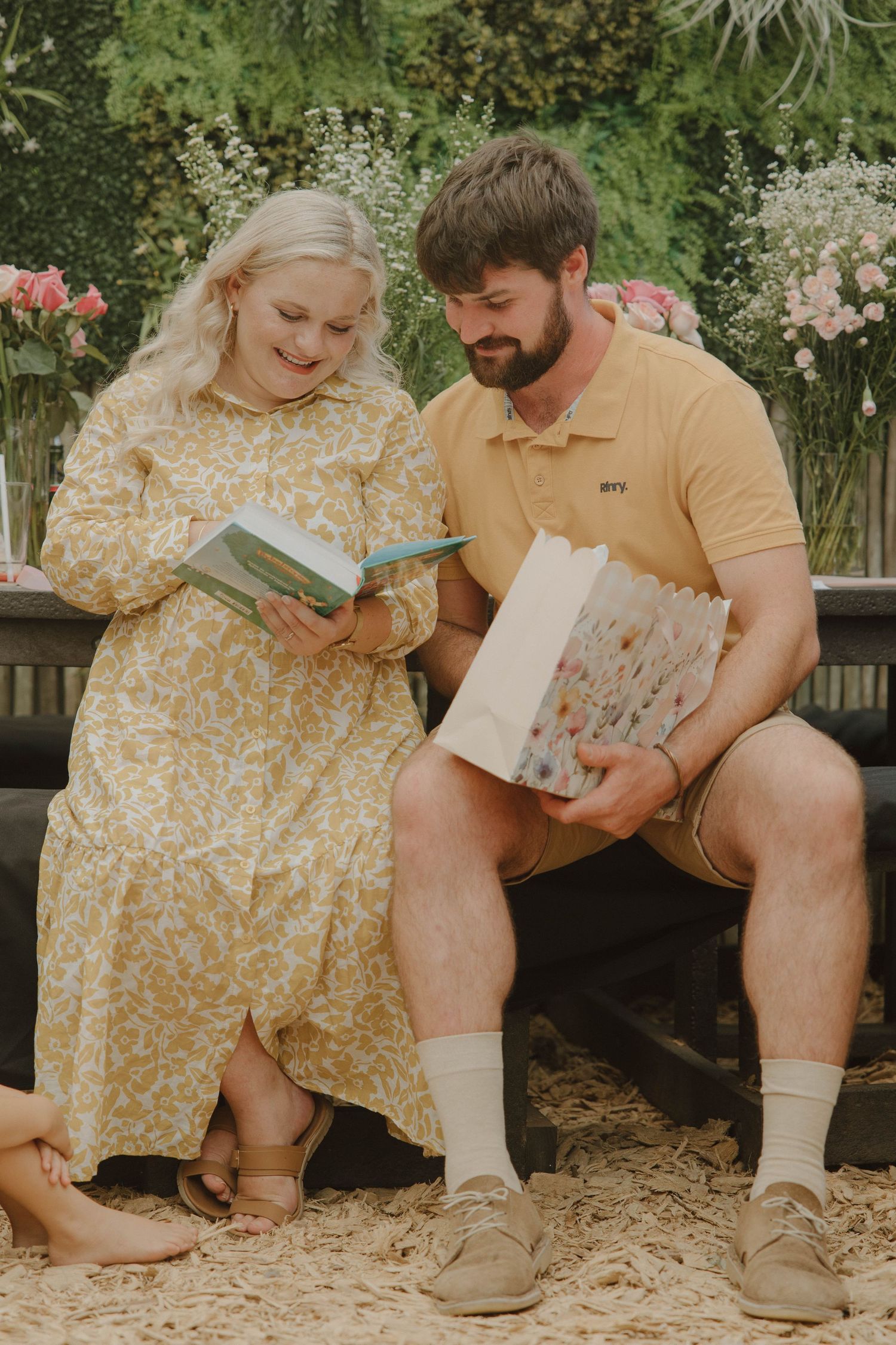 Mom-to-be opening gifts at intimate baby shower in Jeffrey’s Bay