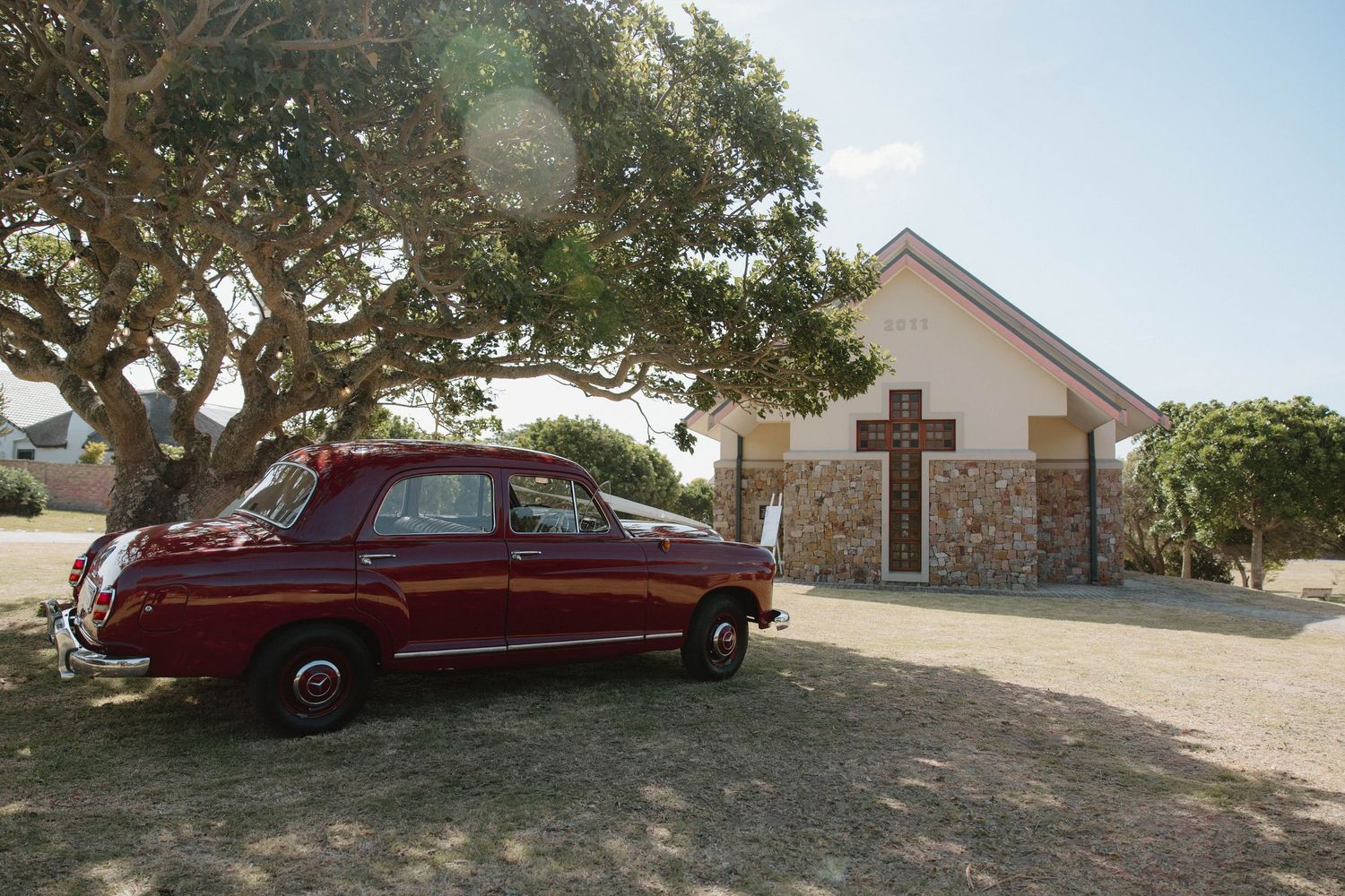 Wedding car outside of chapel at wedding in Eastern Cape