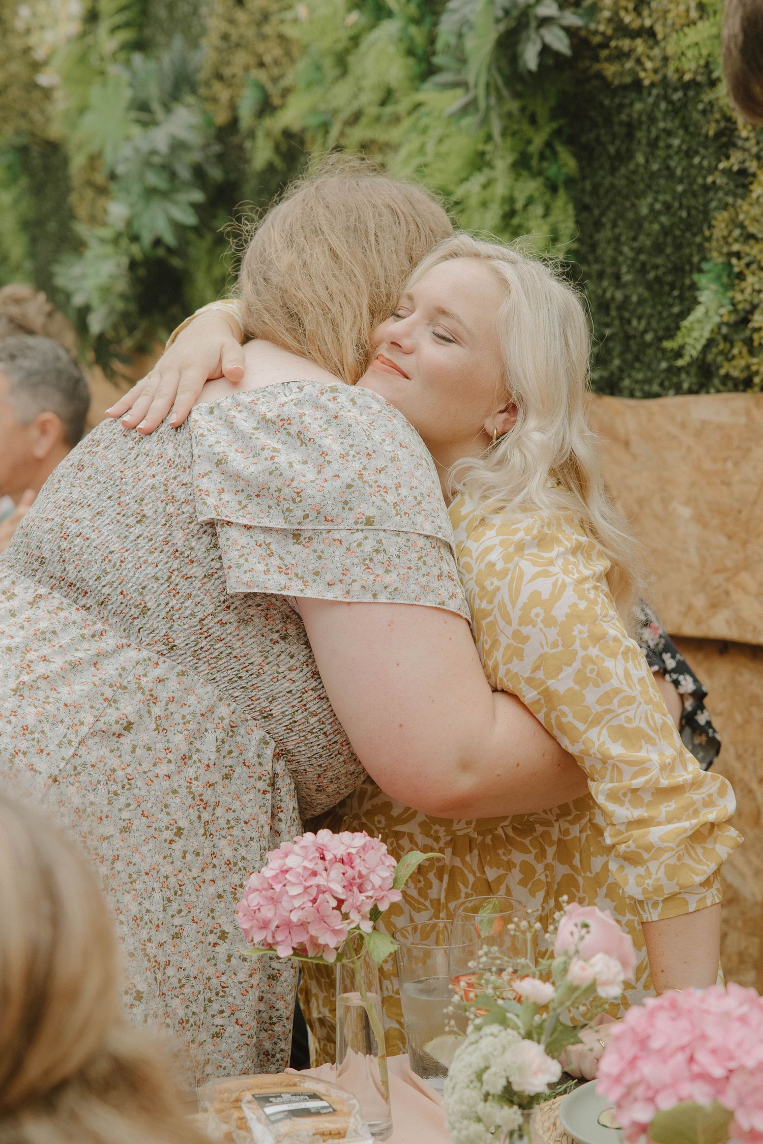 Emotional hug between guests at Jeffrey’s Bay baby shower