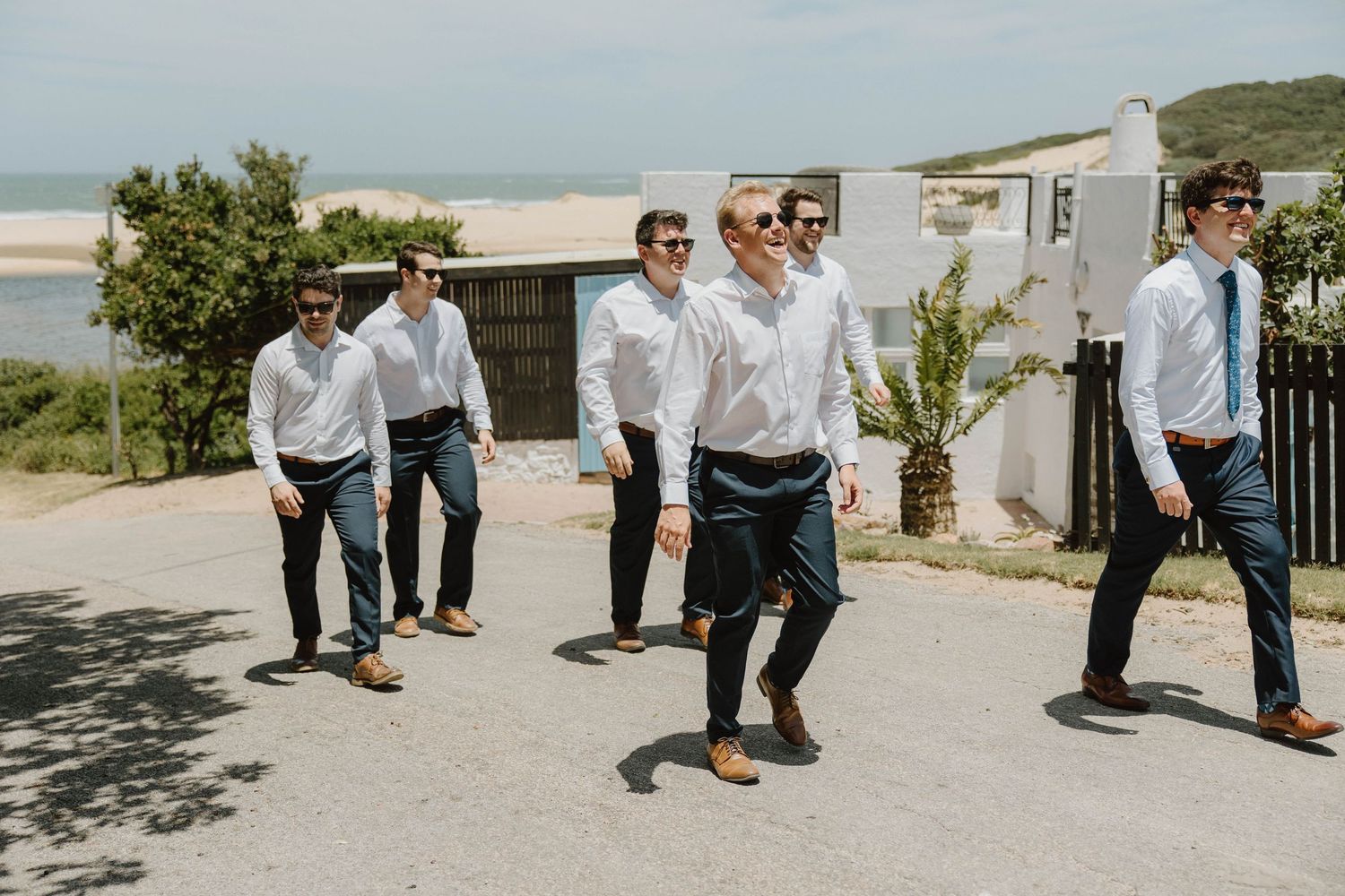 Candid groom and groomsmen moment before wedding in Eastern Cape