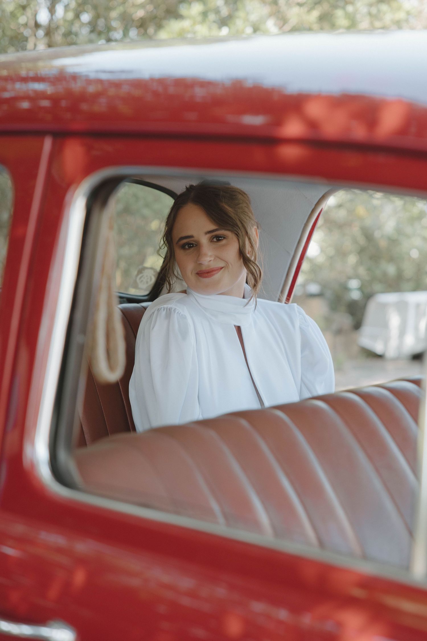 Portrait of bride inside bridal car at wedding in Eastern Cape
