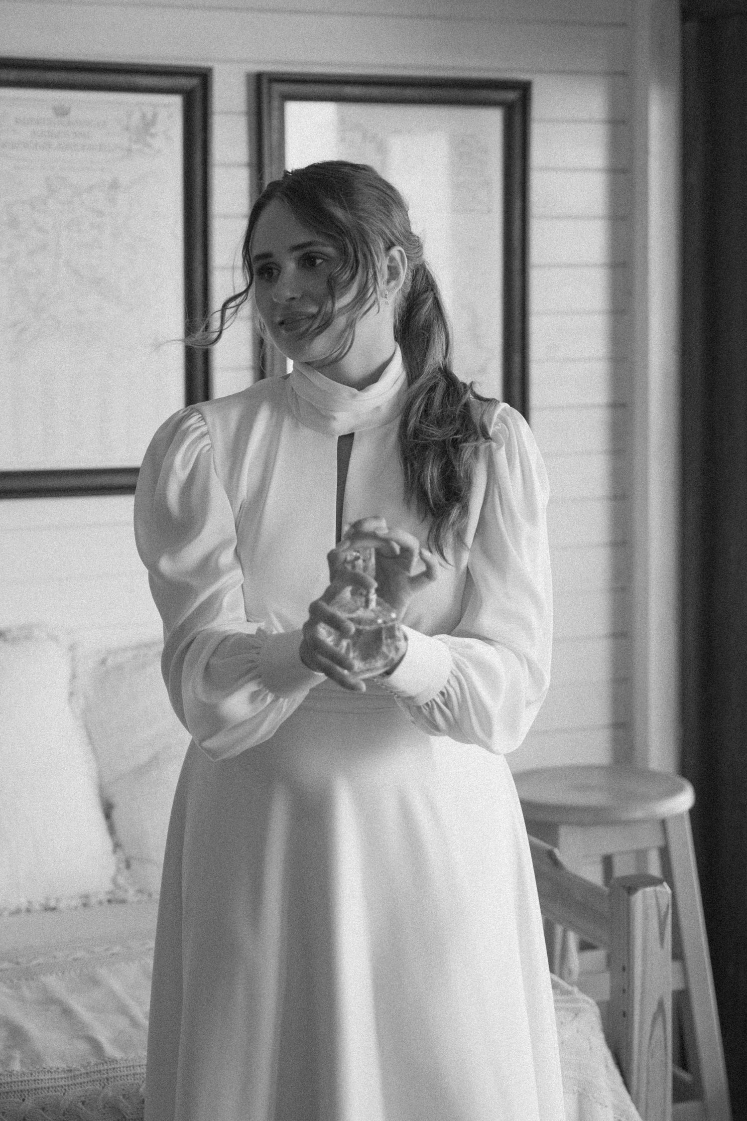 Bridal portraits of bride getting ready