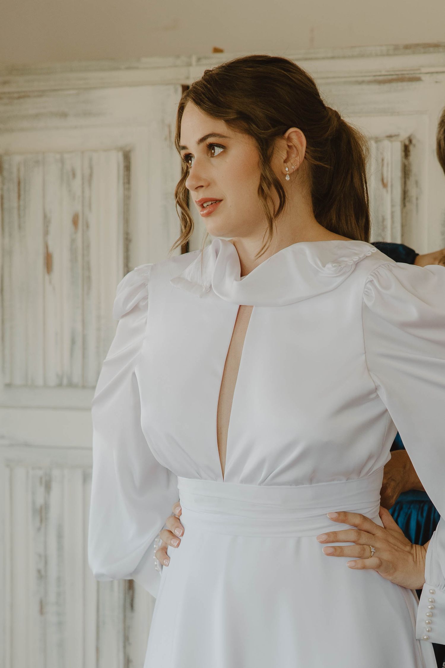 Portrait of bride getting ready and dressed