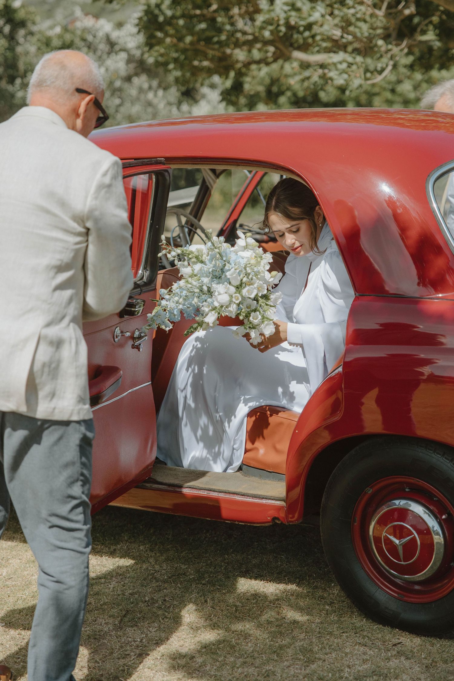 Bride getting out of wedding car at Eastern Cape wedding