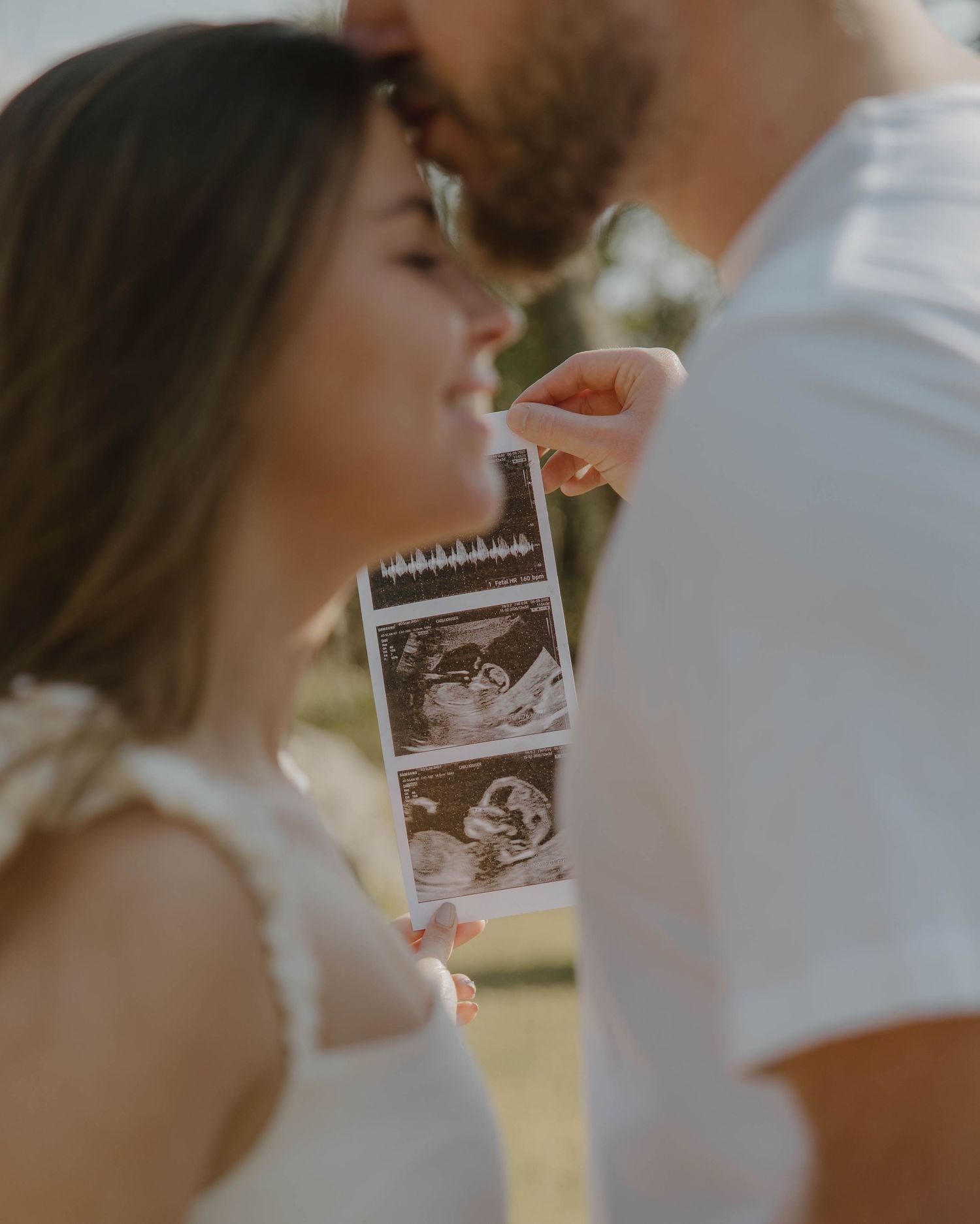 Surprise gender reveal photos with couple