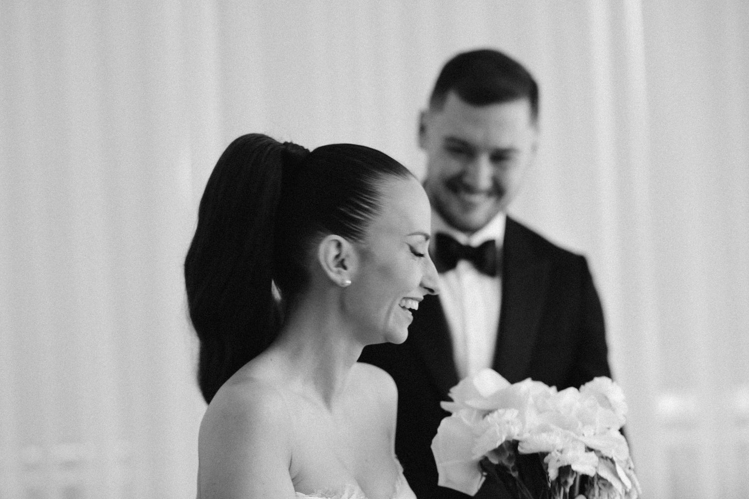 Elegant black and white wedding photography sequence capturing intimate moments.