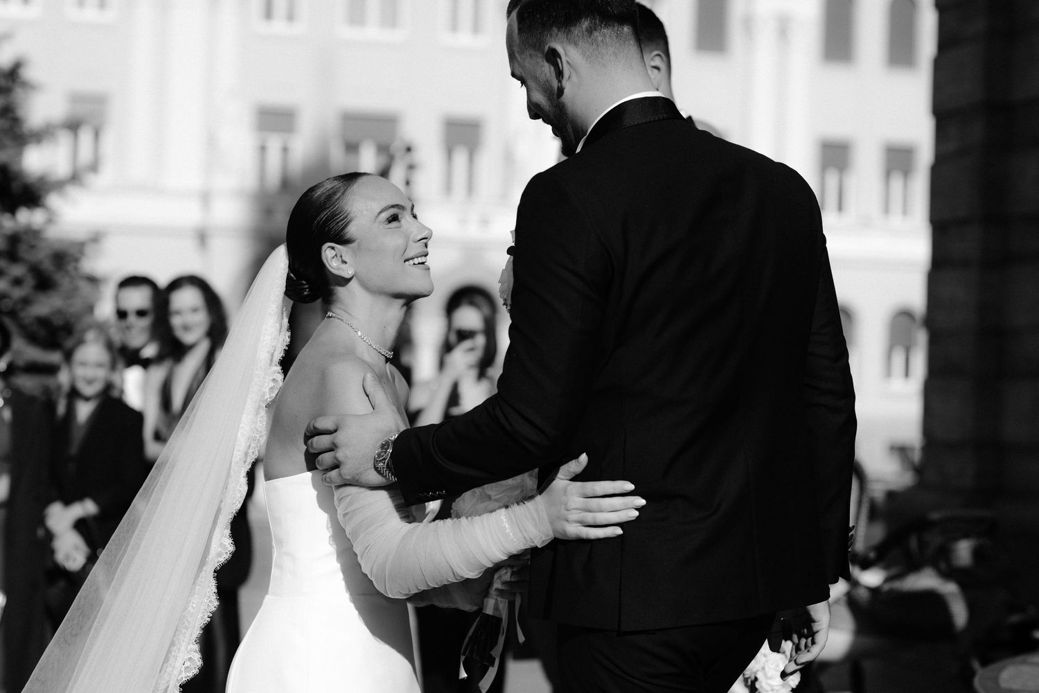A black and white collage of romantic dance poses between couples during a wedding celebration.