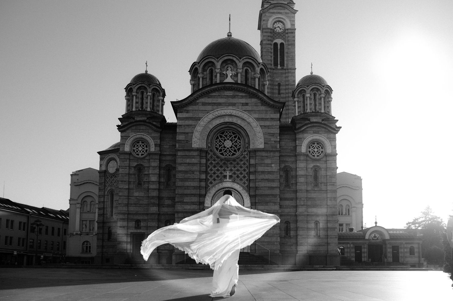 Black and white architectural series showing a grand church or cathedral exterior with dramatic lighting.