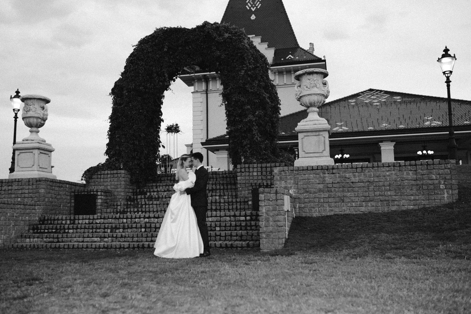 A series of old black and white photographs showing cemetery headstones and monuments arranged in a row.