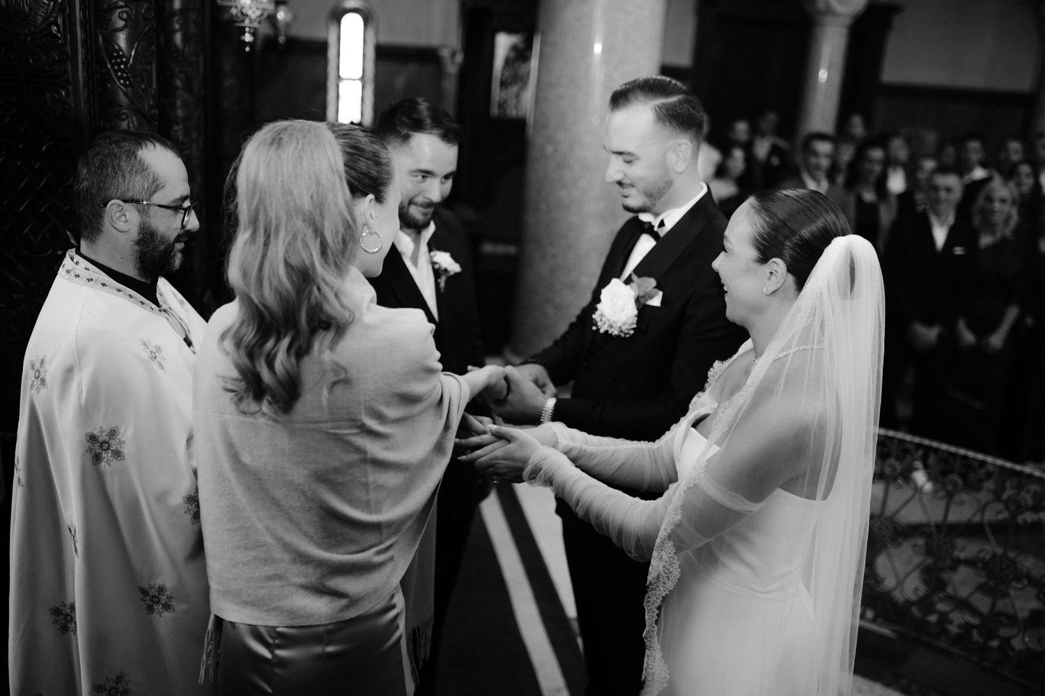 A black and white photo montage of couples dancing at a wedding reception.