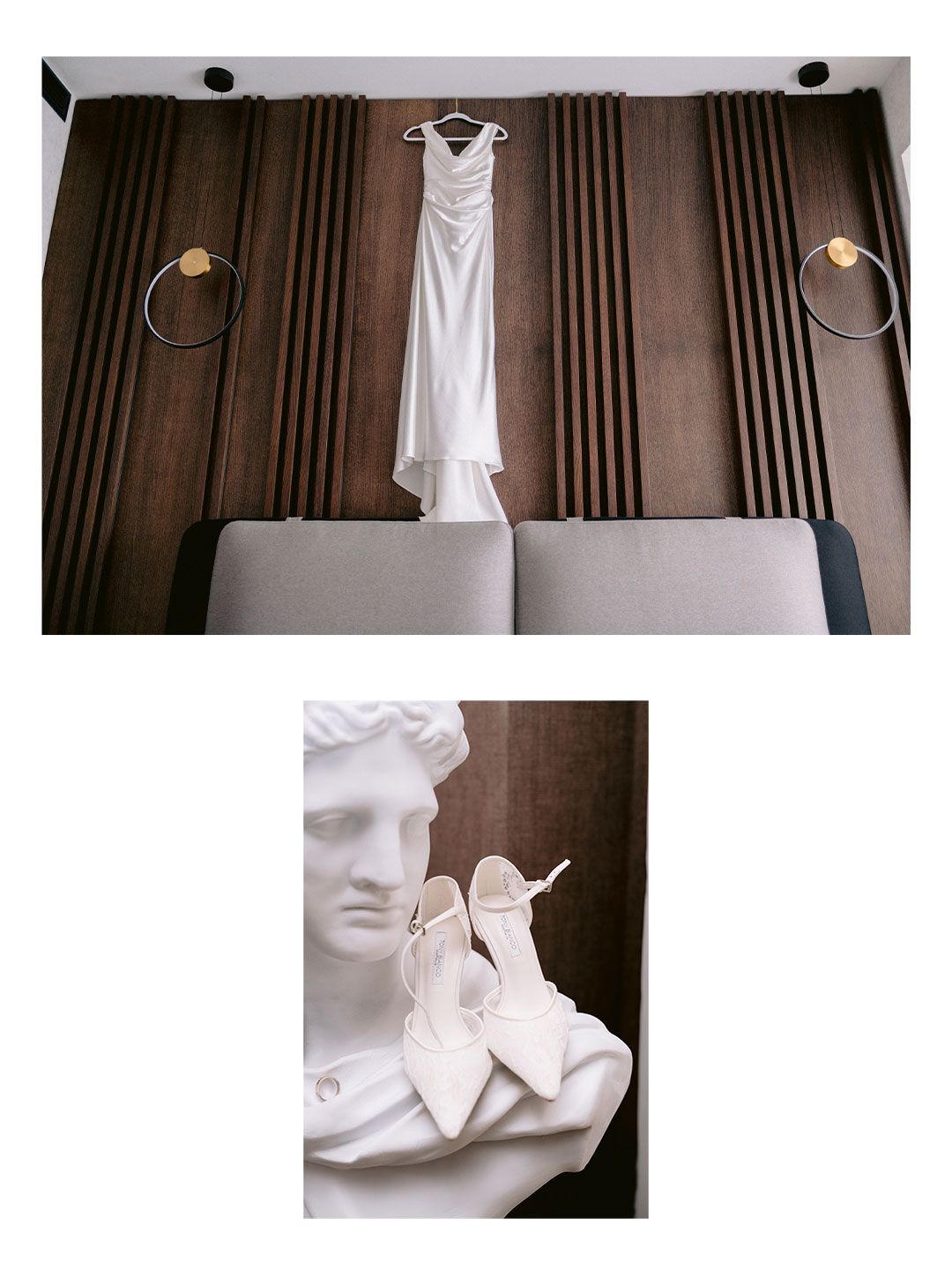 Elegant white wedding dress hanging on curtain rod with bridal shoes beside a classical Greek bust sculpture.