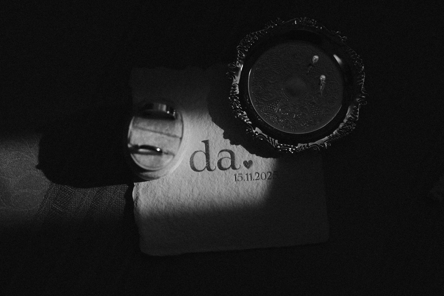 Artistic black and white macro shot of camera equipment.
