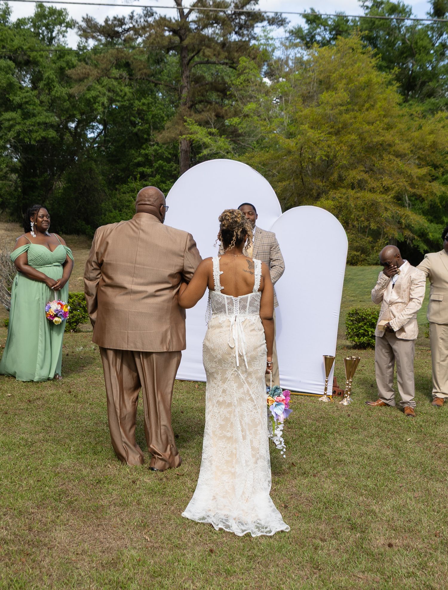 Outdoor backyard wedding ceremony in Georgia photographed by Kaylin Ross Photography