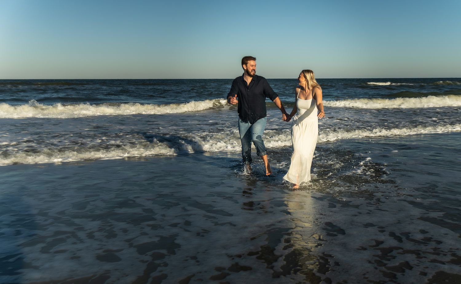 Engaged couple on St. Augustine Beach, North Florida engagement photographer Kaylin Ross