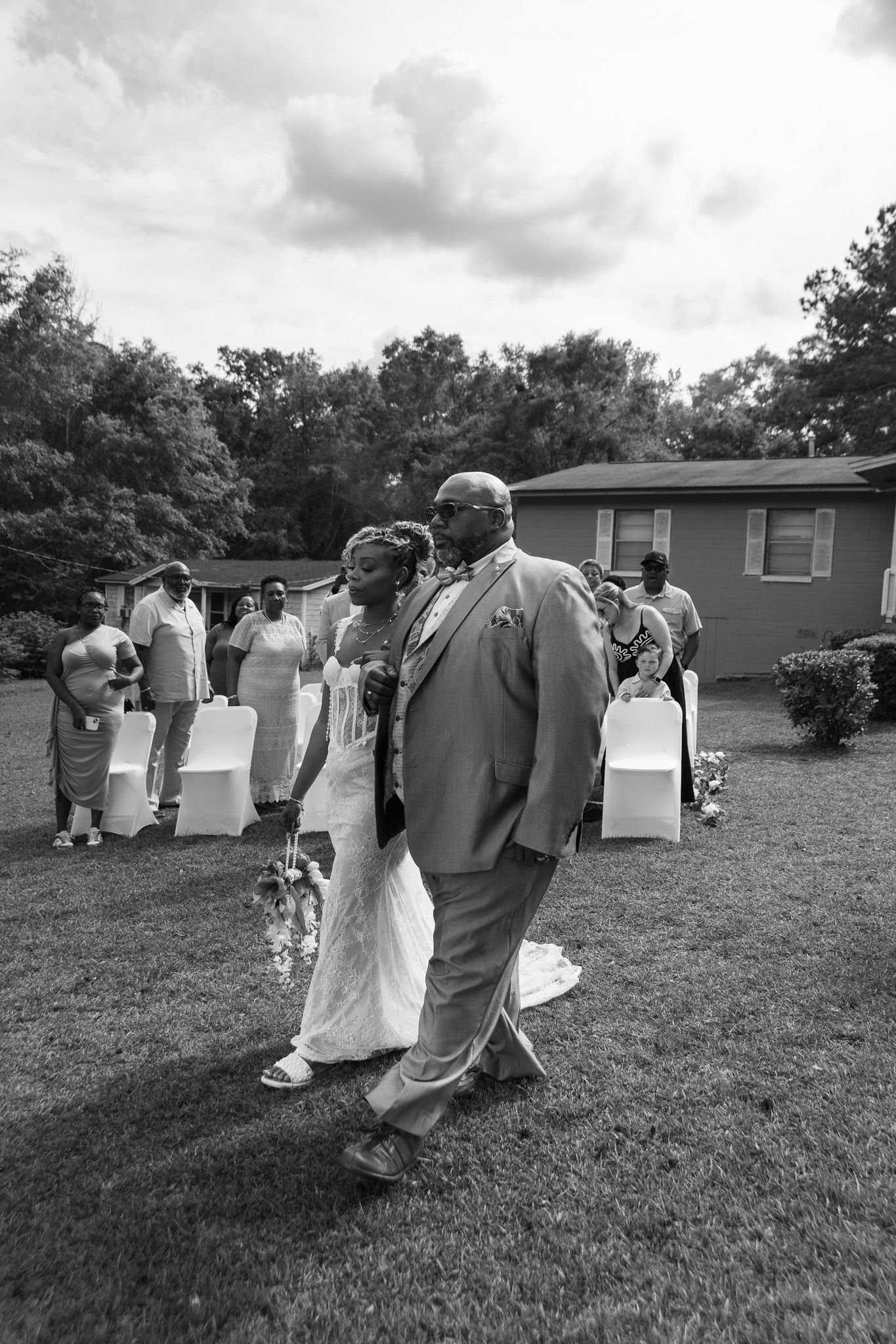 Outdoor backyard wedding ceremony in Georgia photographed by Kaylin Ross Photography