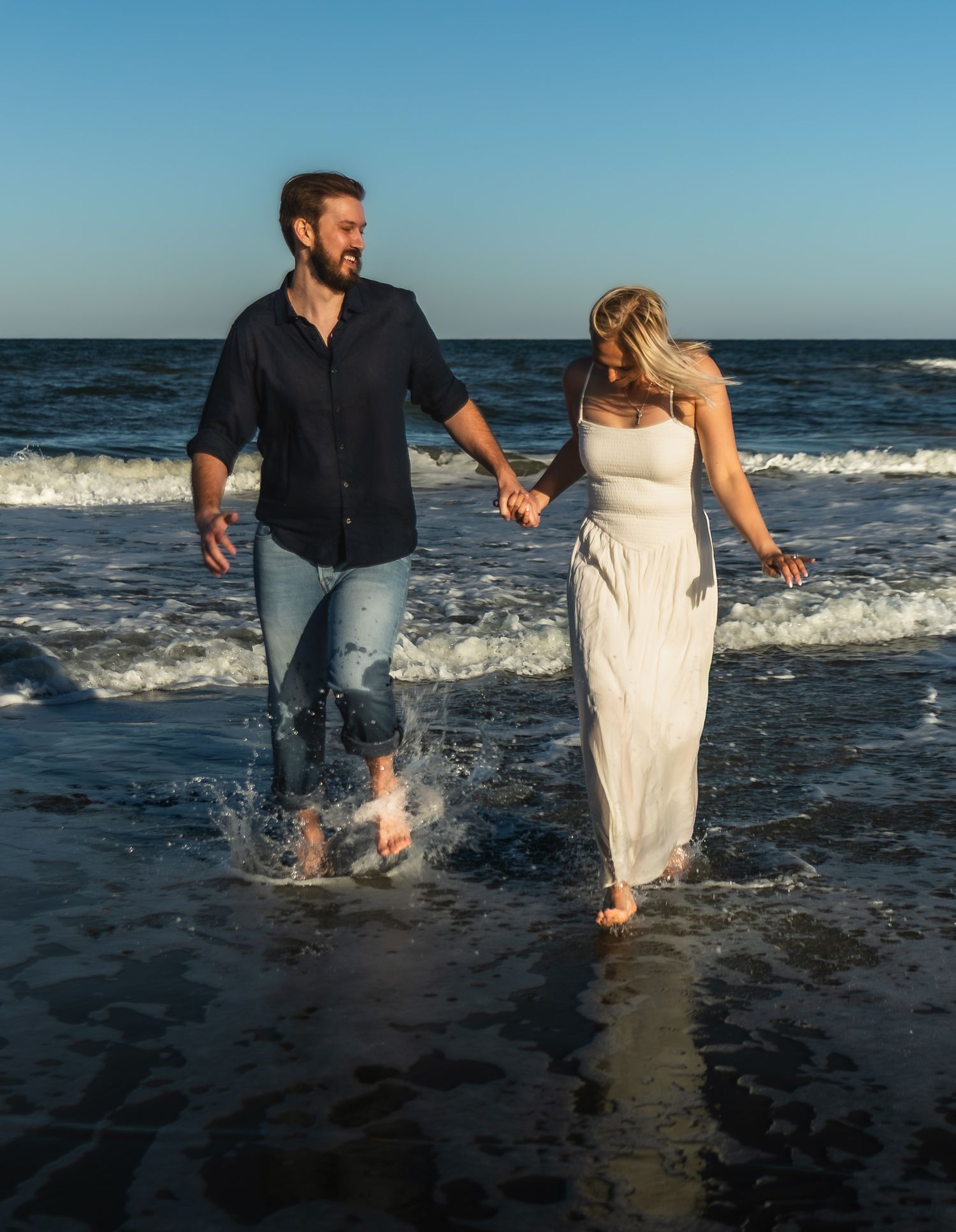 Engaged couple on St. Augustine Beach, North Florida engagement photographer Kaylin Ross