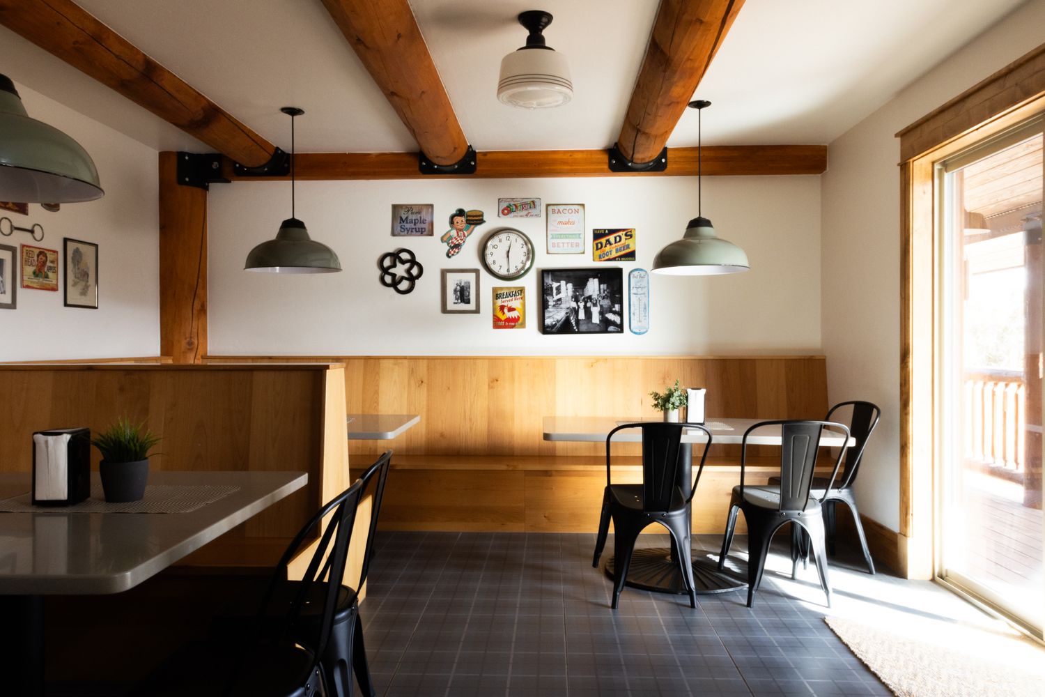 Warm, inviting restaurant showroom. Elegant wood accents and industrial furniture. Premium imagery for hospitality branding and marketing.
