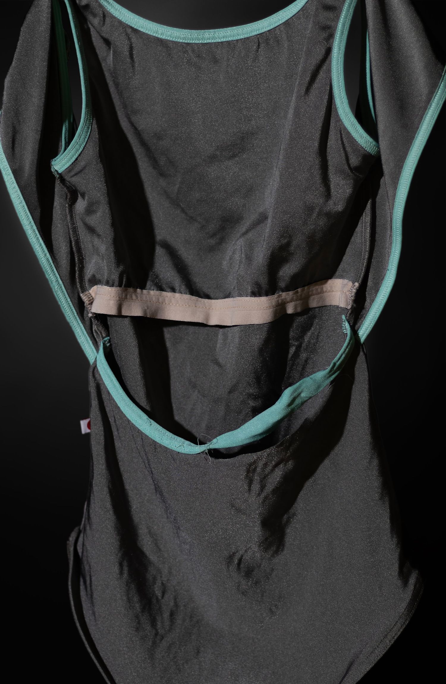 Athletic apparel detail. Capturing the silhouette and functional design of high-performance dancewear. Premium activewear and garment stock.