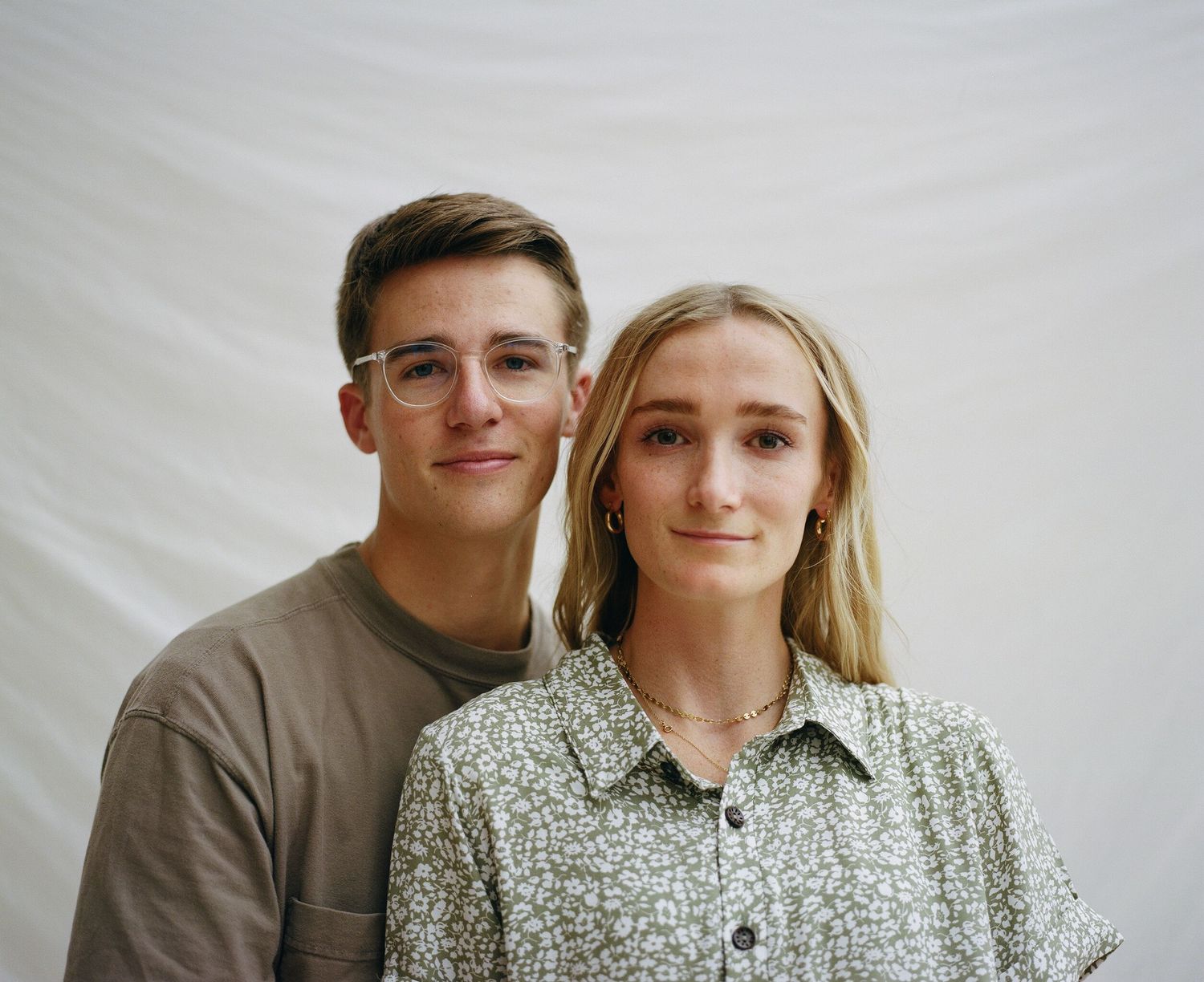 Natural, timeless couple’s portrait with soft, high-key lighting—ideal for lifestyle branding, editorial features, and commercial campaigns.