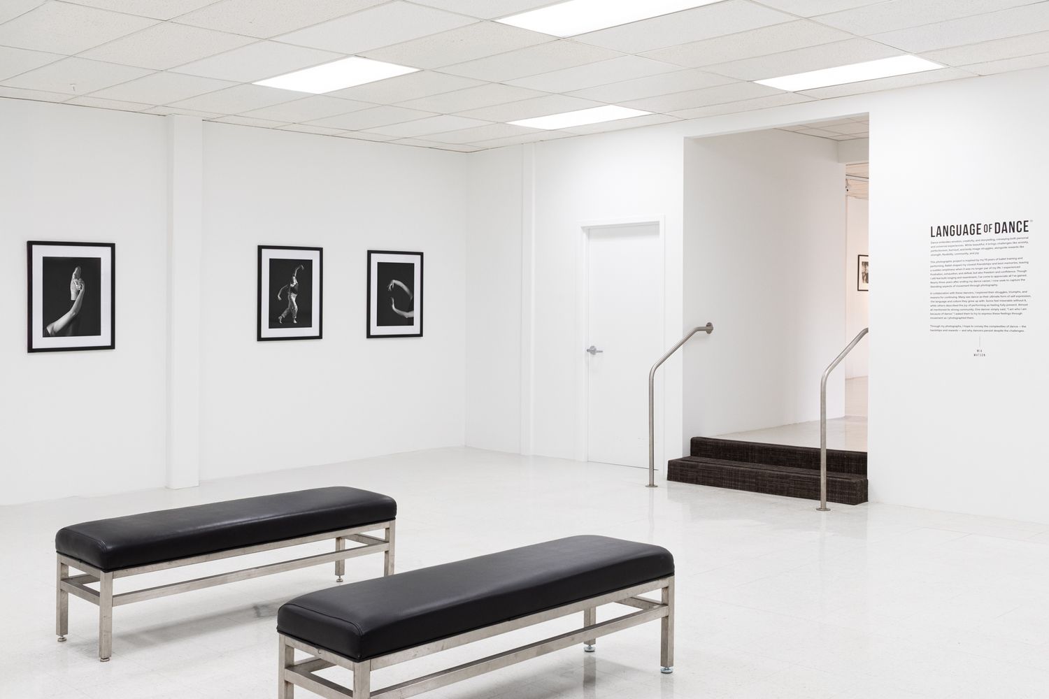 Atmospheric study of a modern art space. Exploration of white space and symmetry. Professional gallery photography.