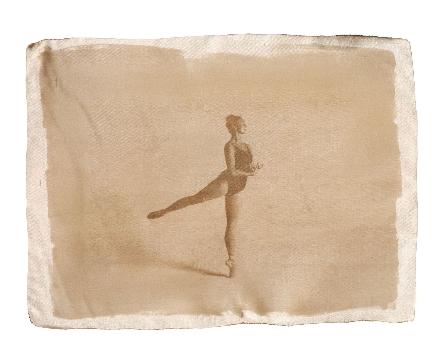 Van Dyke Brown print on satin. Capturing the fluid motion of dance through archival textures. Fine art and luxury textile photography.