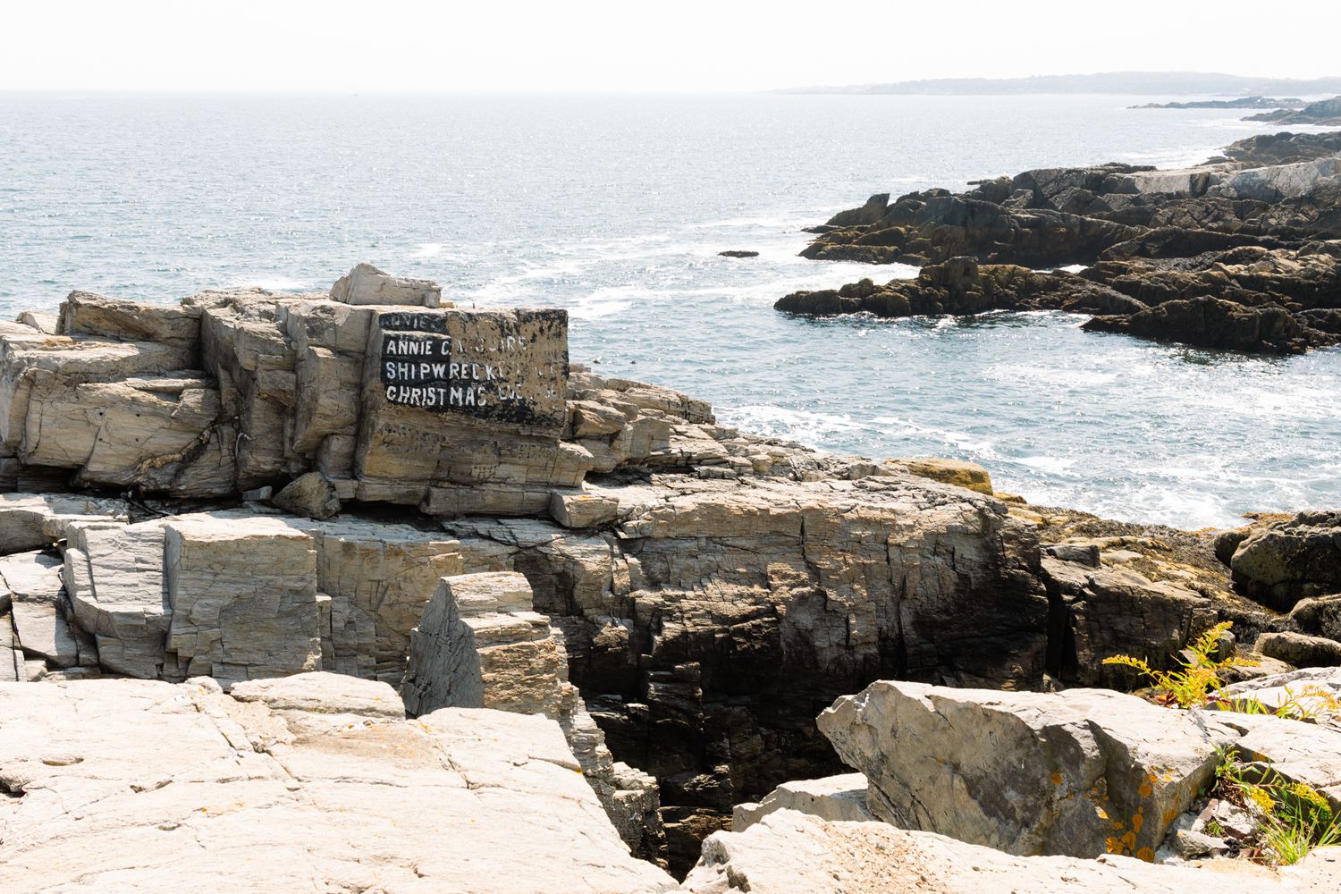 Explore the historic charm of the Portland, Maine waterfront, where colorful fishing boats and brick warehouses line the scenic harbor.