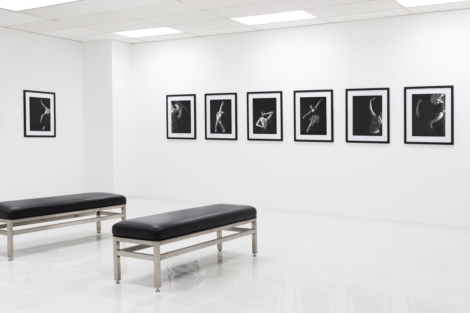Atmospheric study of a modern art space. Exploration of white space and symmetry. Professional gallery photography.