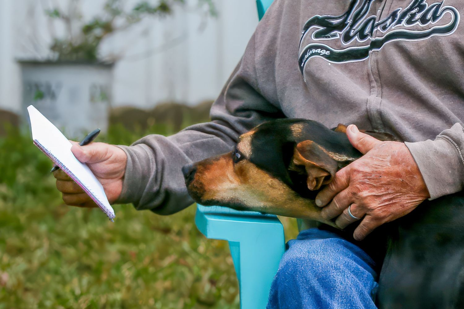 Pawfect Moments Photography explaining the process to your furbaby so your pet can feel comfortable and relaxed during the session process.