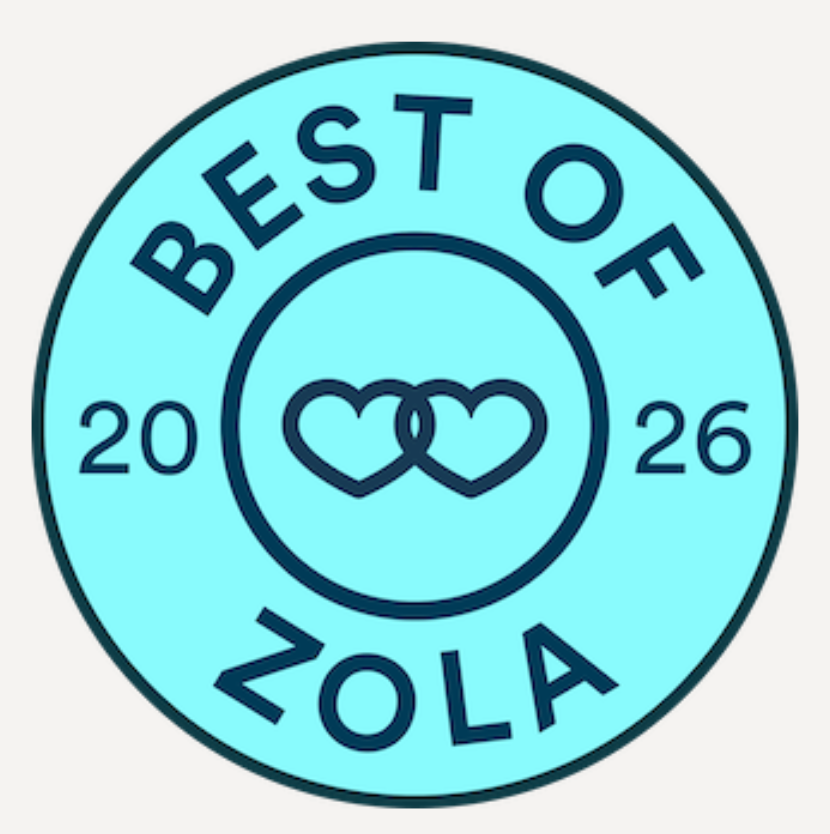 Best of Zola 2026 award badge, a teal circular seal with two interlinked hearts and bold navy text.