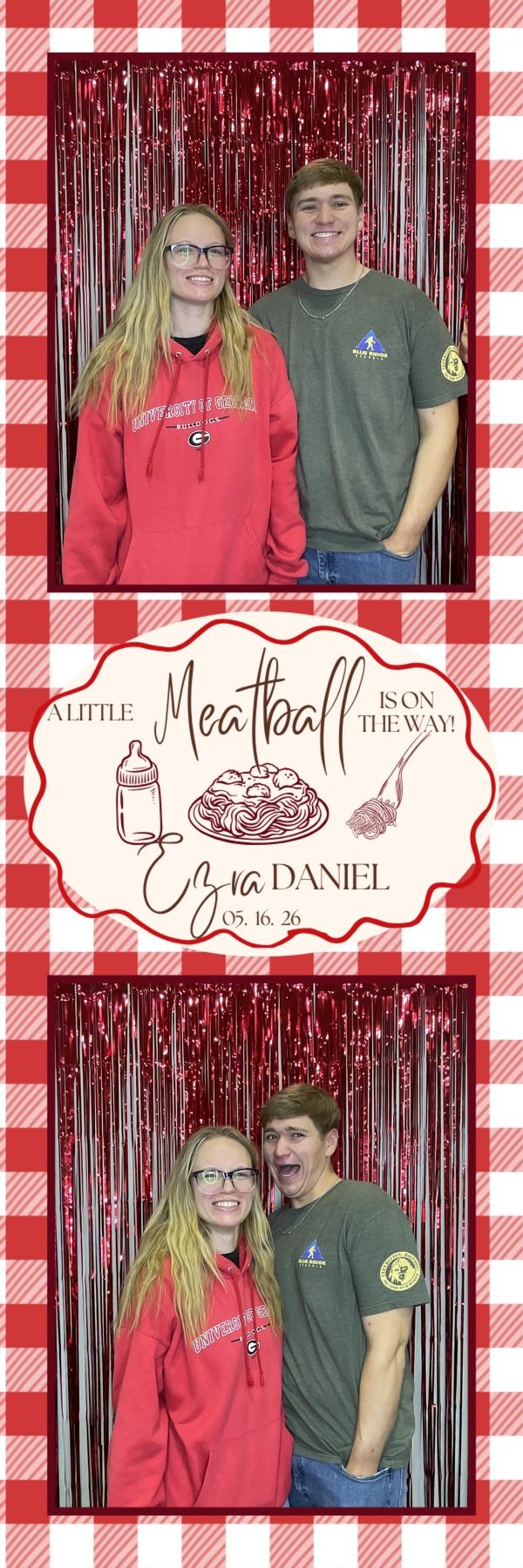 Couple poses at a baby shower photo booth for Ezra Daniel, due 05.16.26, with red tinsel backdrop and Italian theme.