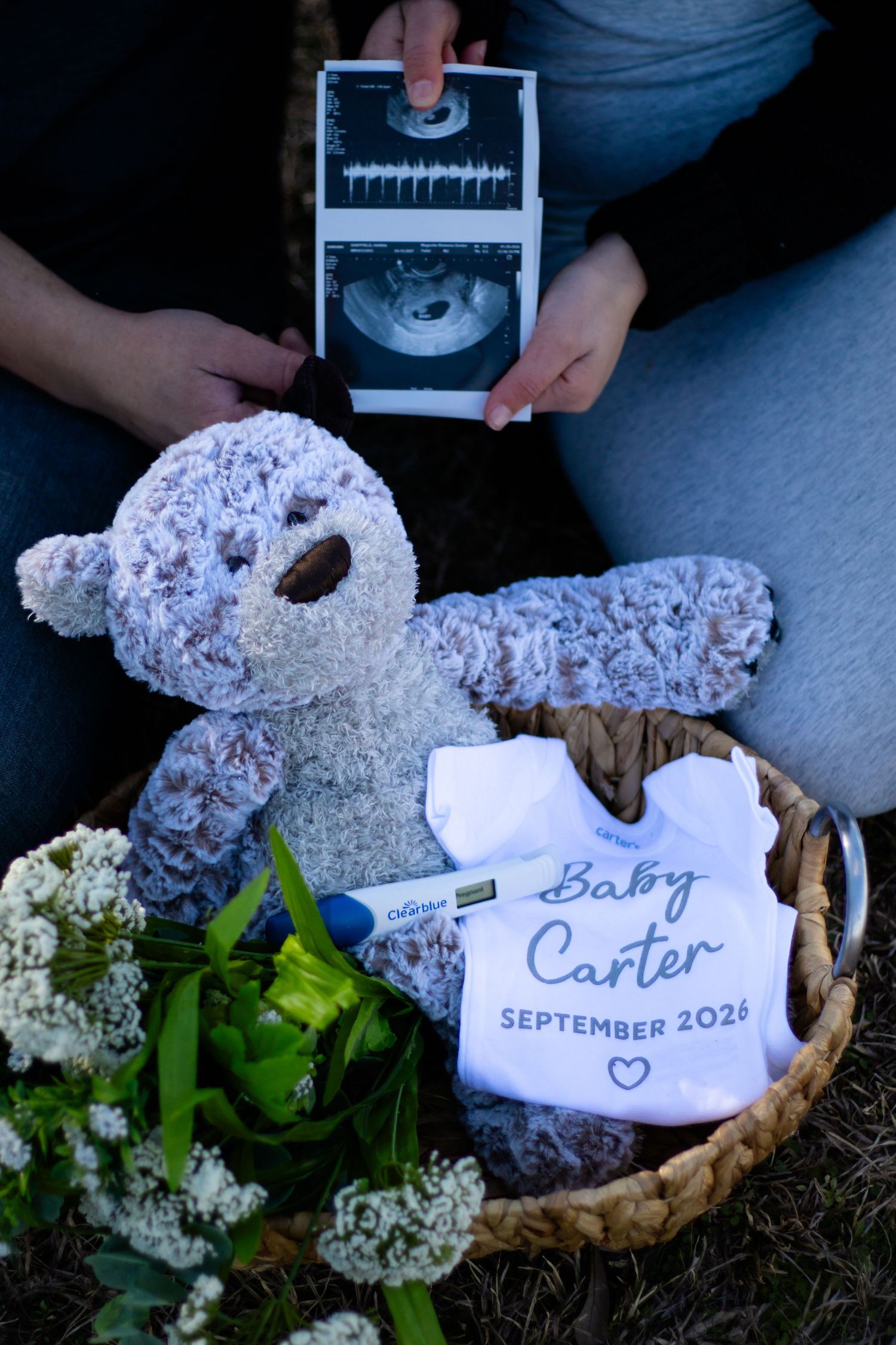 Baby Carter September 2026 pregnancy announcement with teddy bear and ultrasound.