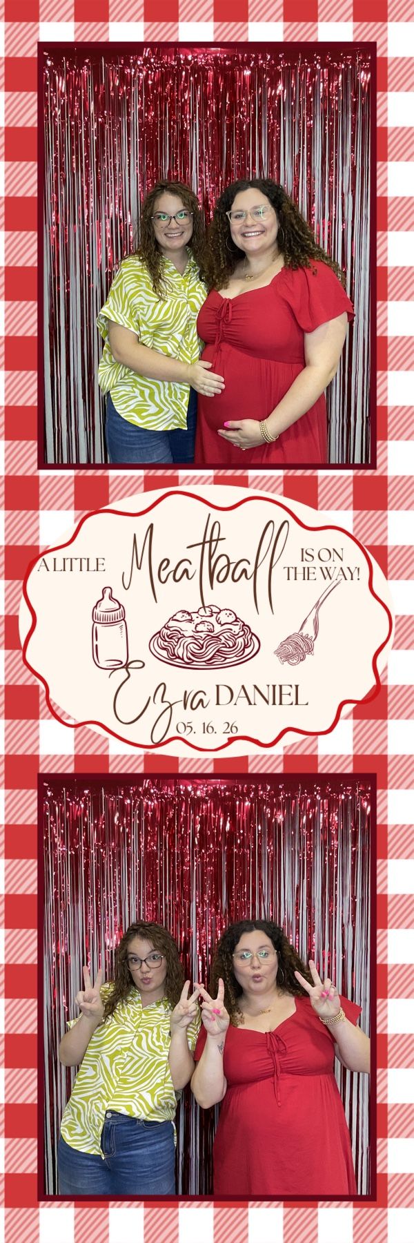 Two women pose at a baby shower photo booth with red tinsel backdrop celebrating baby Ezra Daniel due 05.16.26.