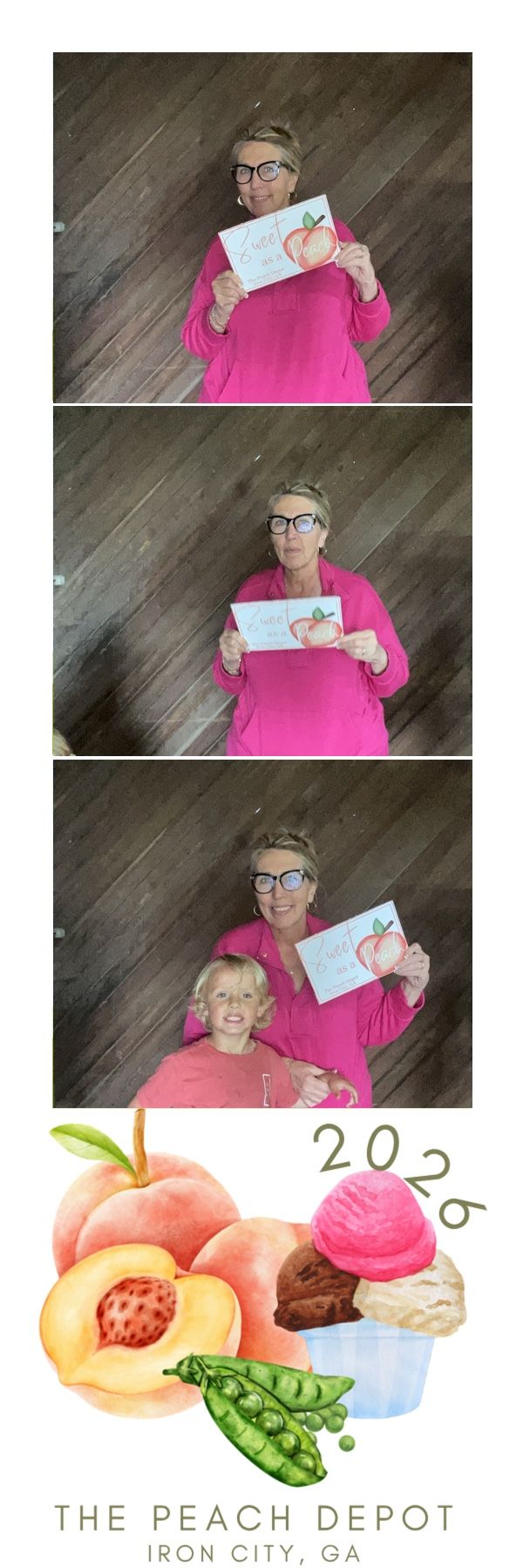 Woman in pink hoodie holding peach sign with child at The Peach Depot photo booth, Iron City, GA 2026.
