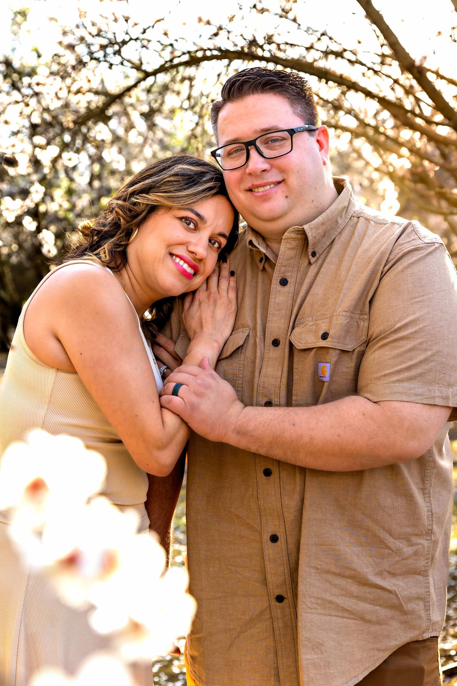 Clovis, Ca family photographer capturing in blossoms