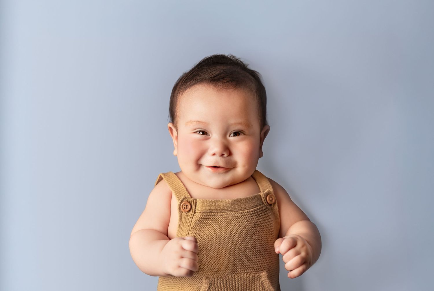 fresno newborn photographer capturing meaningful smiles
