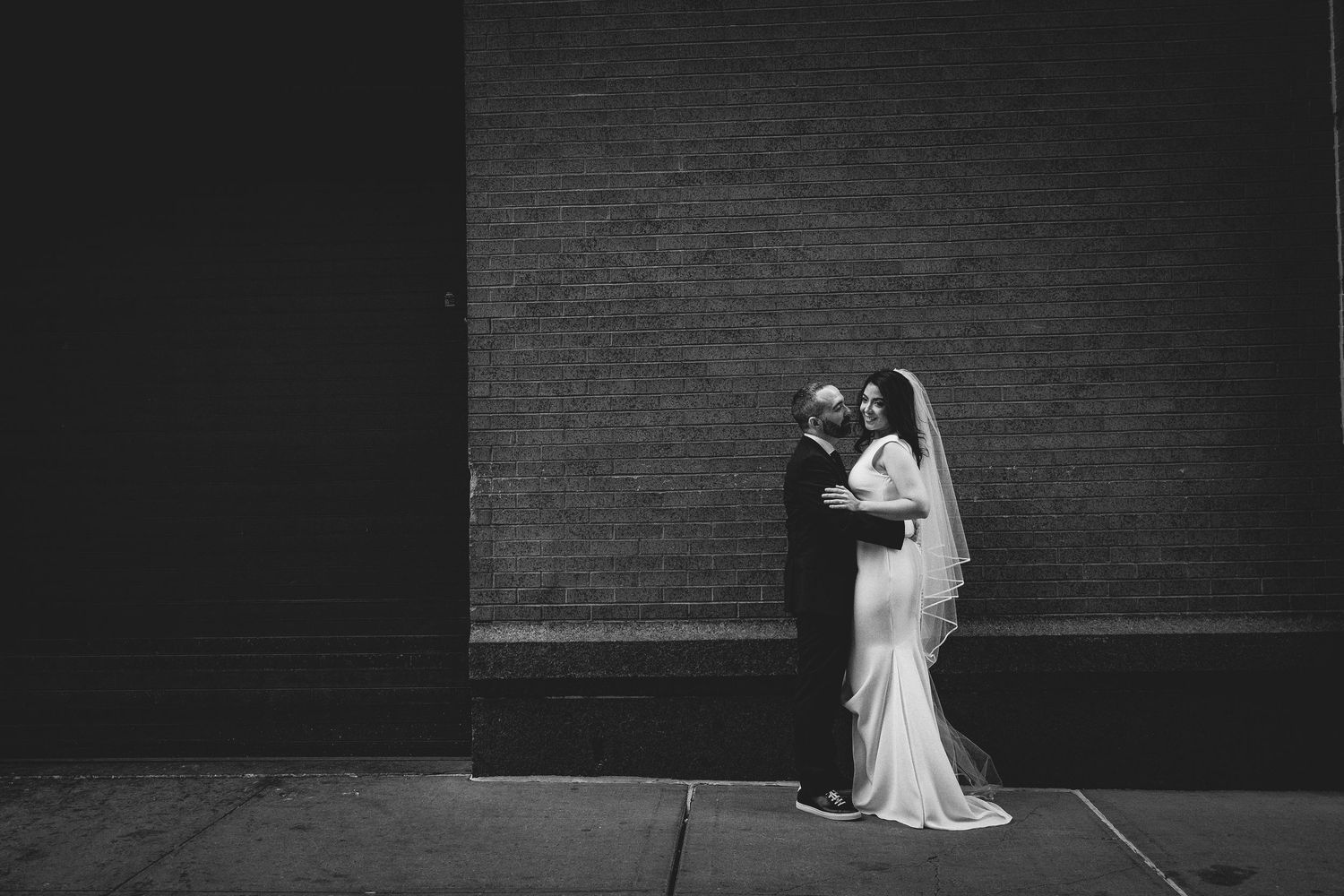 Chris and Rocio wedding portraits by Houston/League City photographer Robert Paul | cinematic outdoor urban New York City